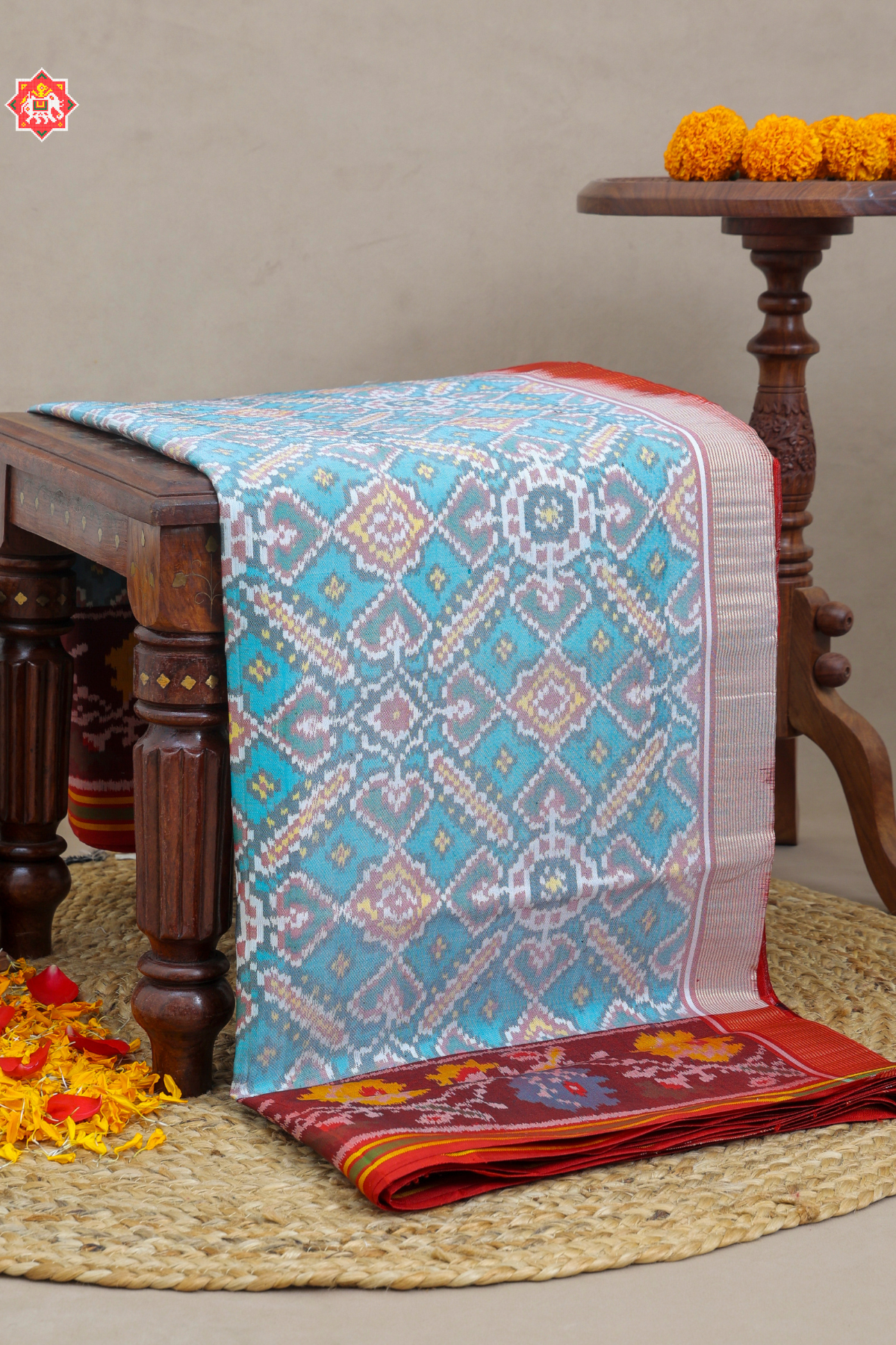 Paan chanda with flowers designer border and pallu border contras Semi double ikat patola saree