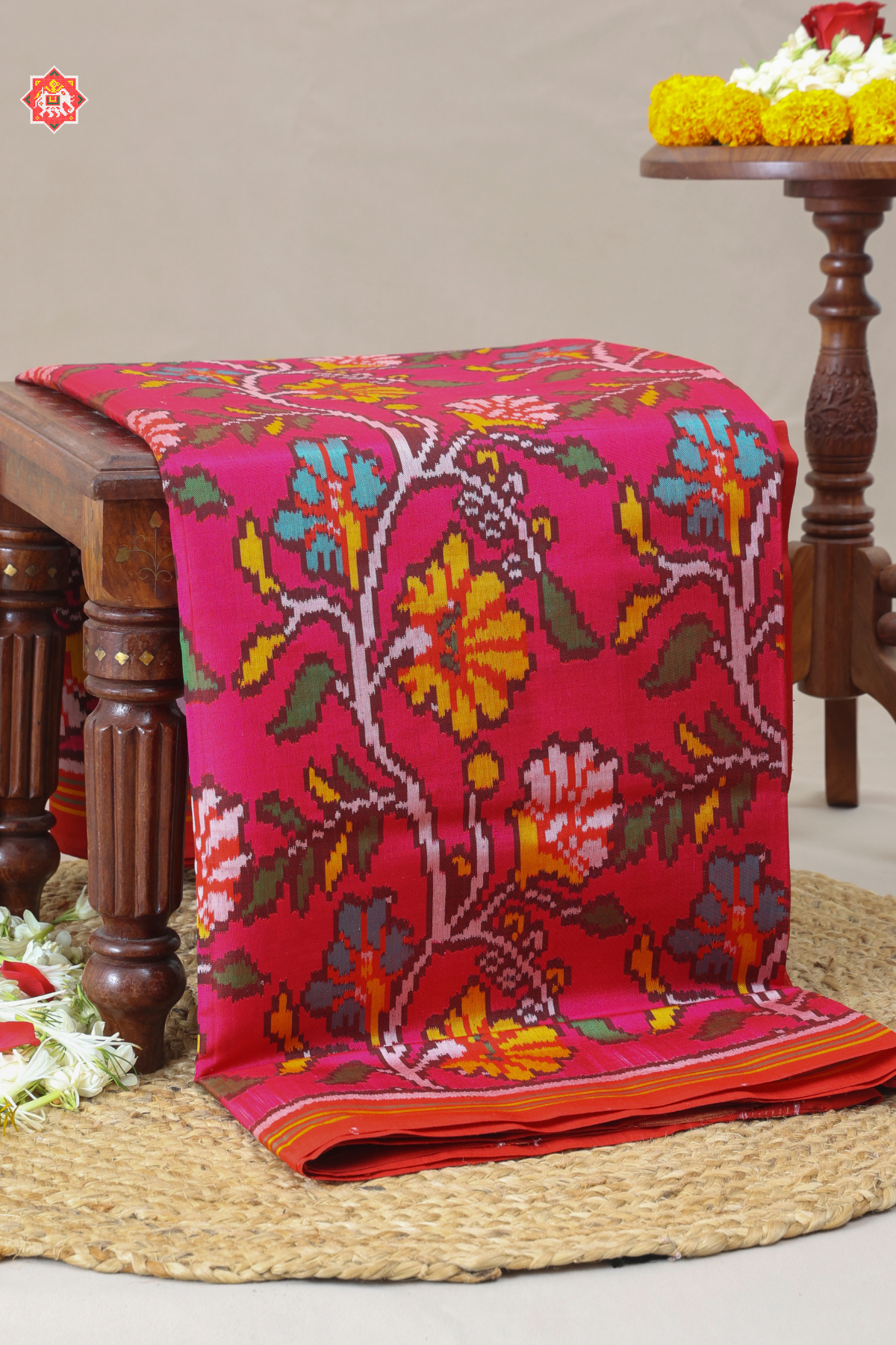 Master piece flowers with leaves design & small lines border semi double ikat patola saree