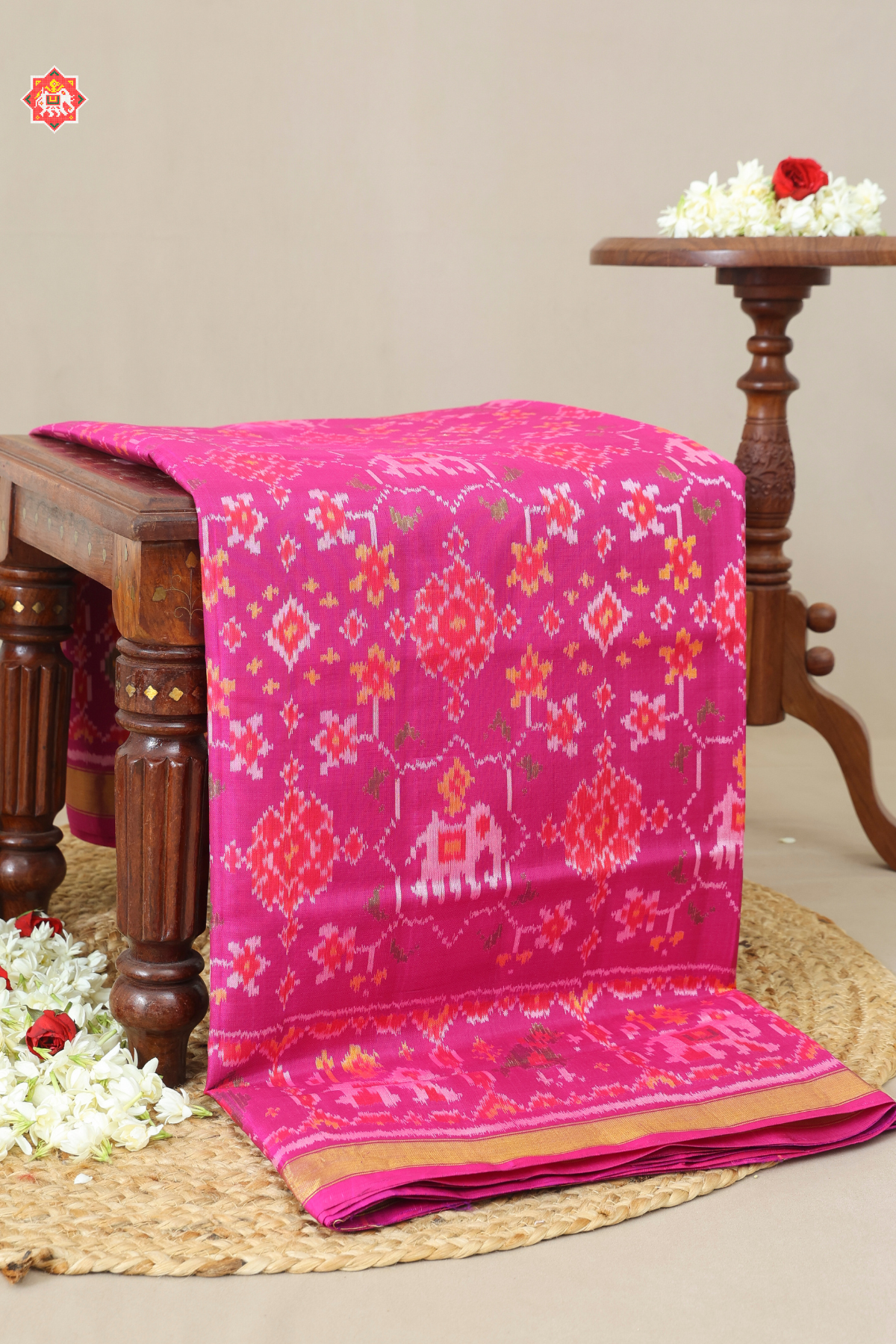 Navaratna design with elephant & small tissue border single ikat patola saree