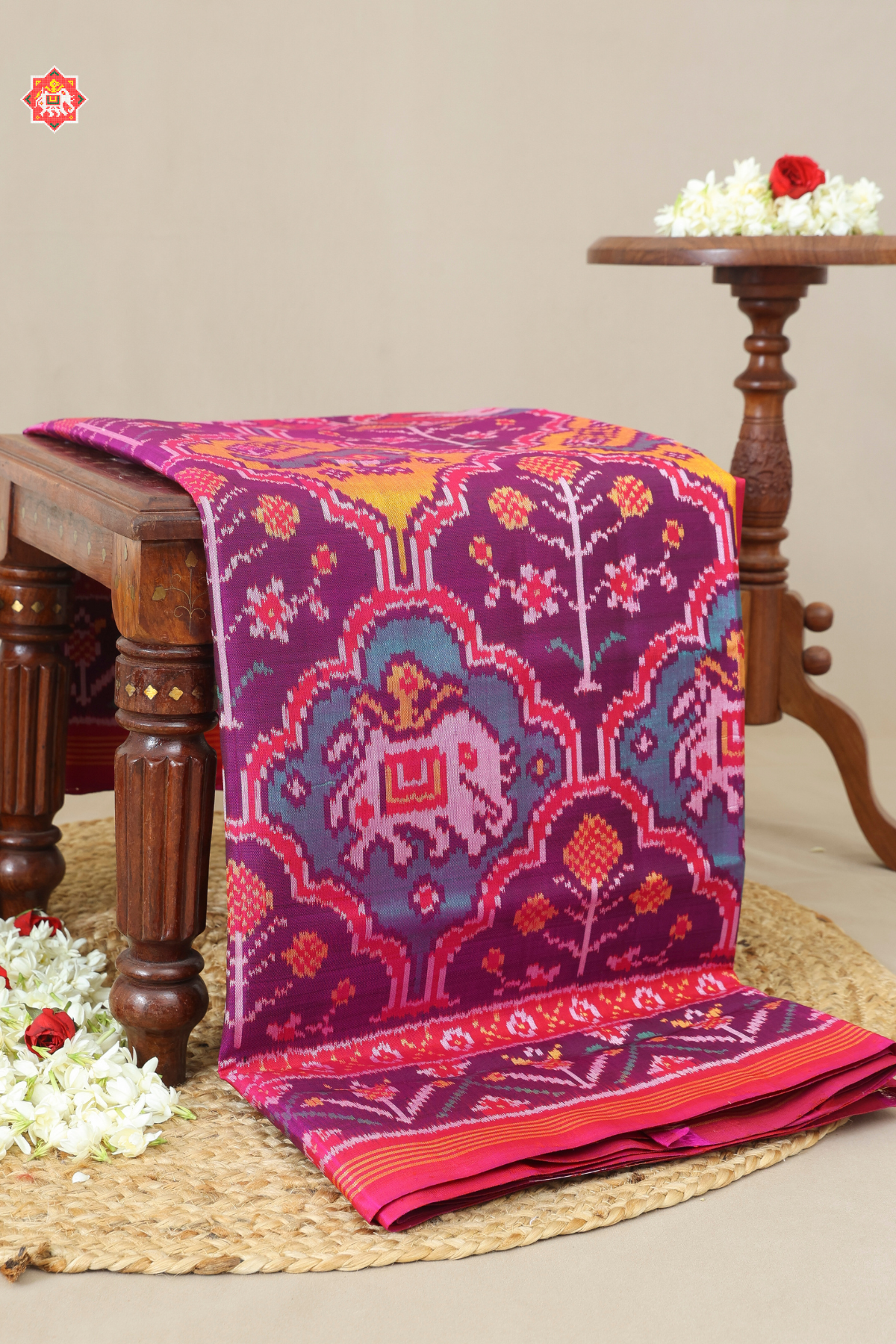 Masterpiece 3 motifs design with flowers border semi double ikat patola saree