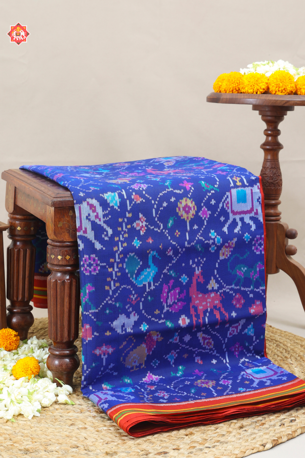 Master piece Animals with flowers design semi double ikat patola saree