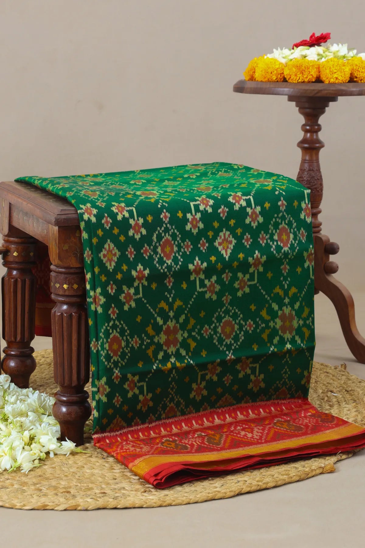 Navratna design with pallu border contras single ikat patola saree