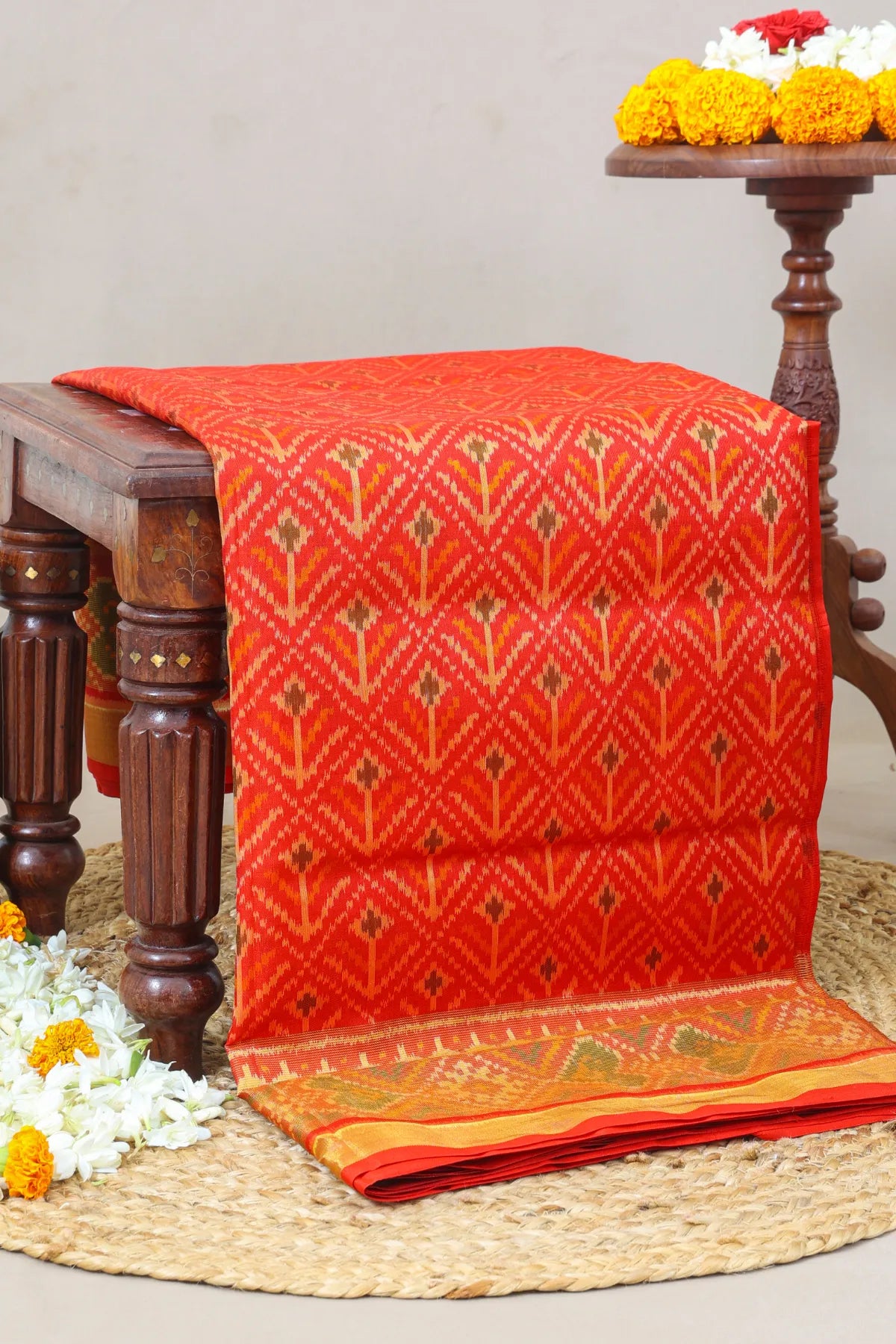 Plain color fancy flower design with tissue border single ikat patola saree
