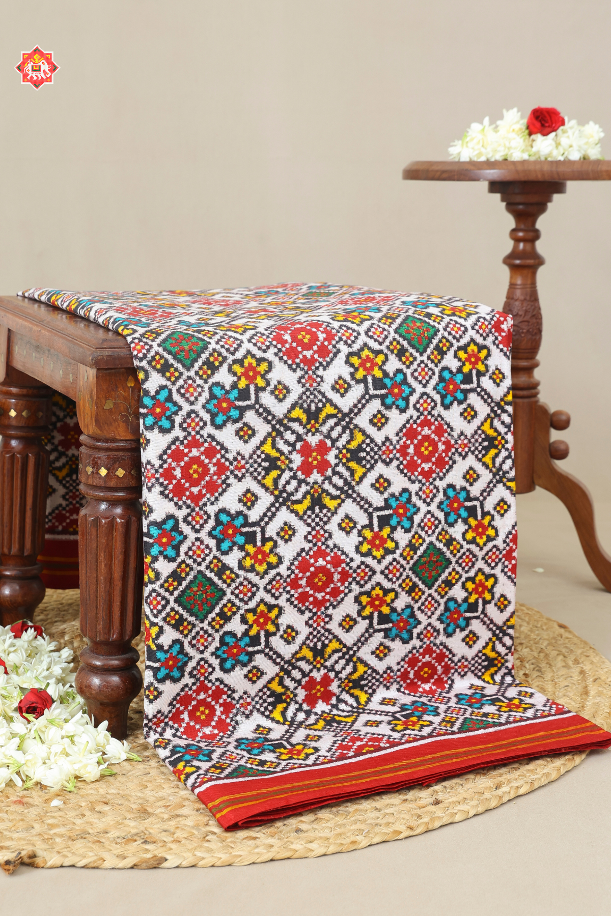 Traditional navratna design with small border pure double ikat patola saree