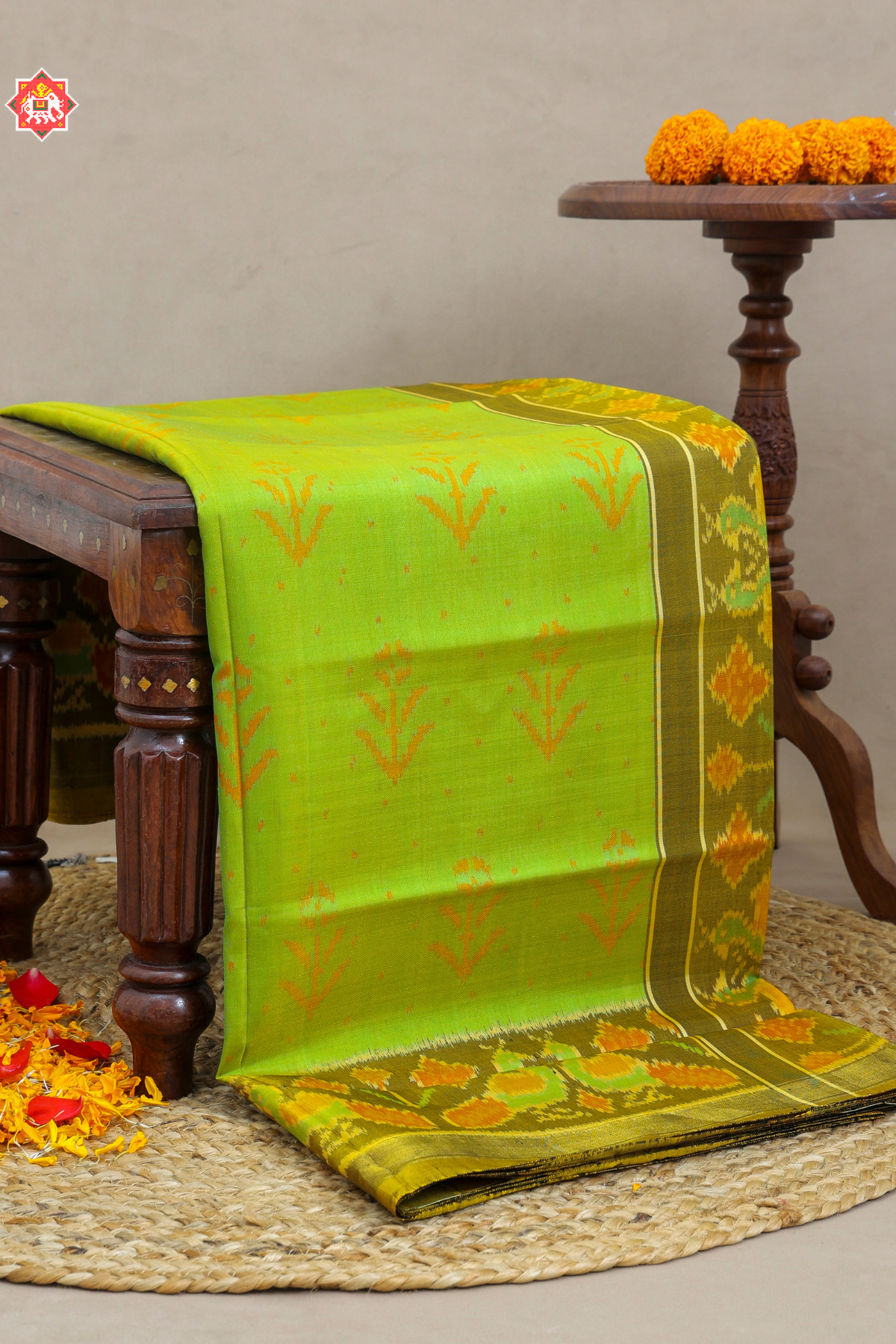 Funcy flower design small tissue border single ikat patola saree