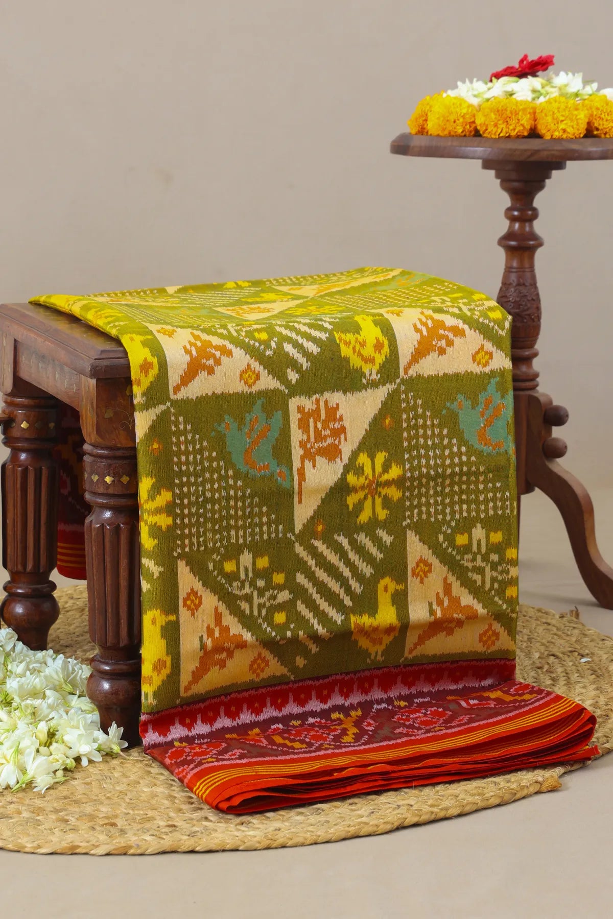 Funncy design with motif pallu border traditional design semi double ikat patola saree