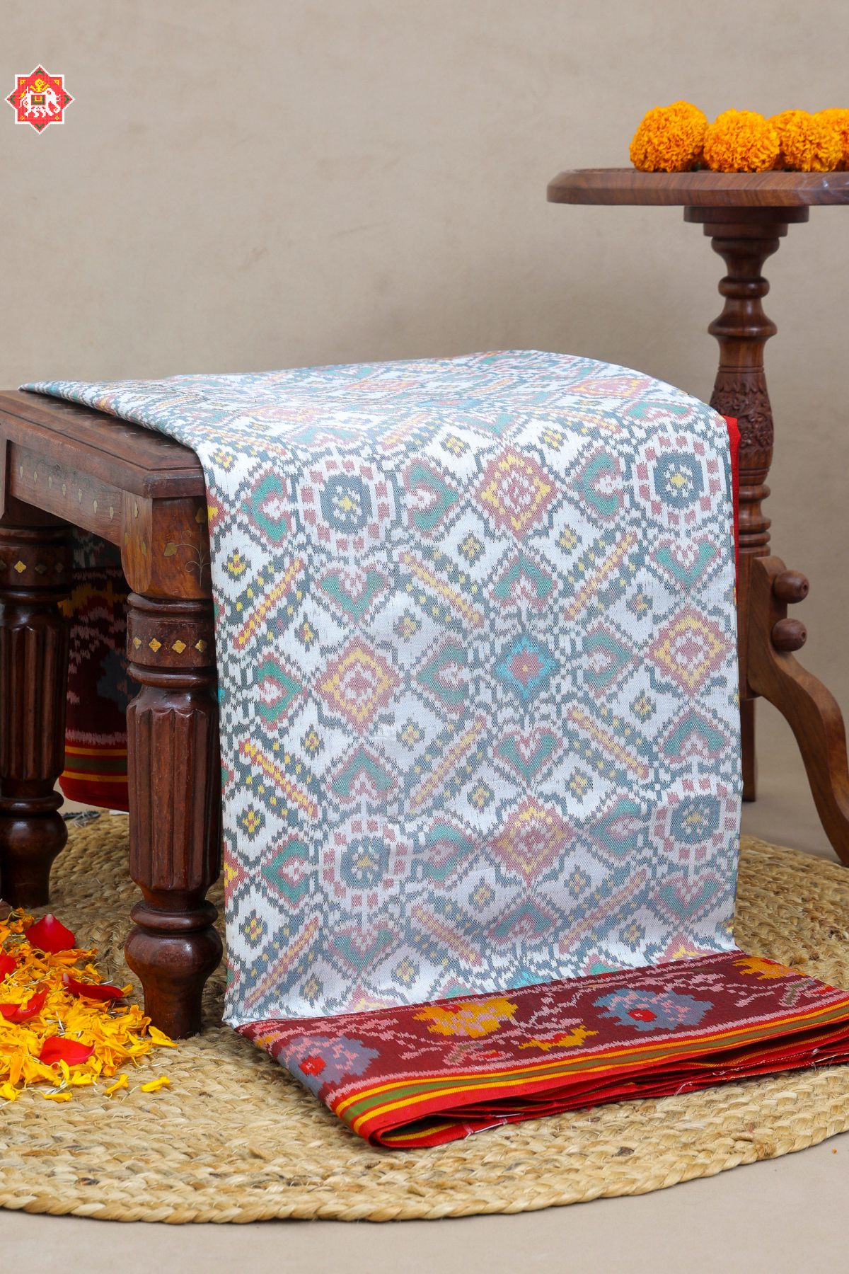 Paan chanda with flowers designer border and pallu border contras Semi double ikat patola saree