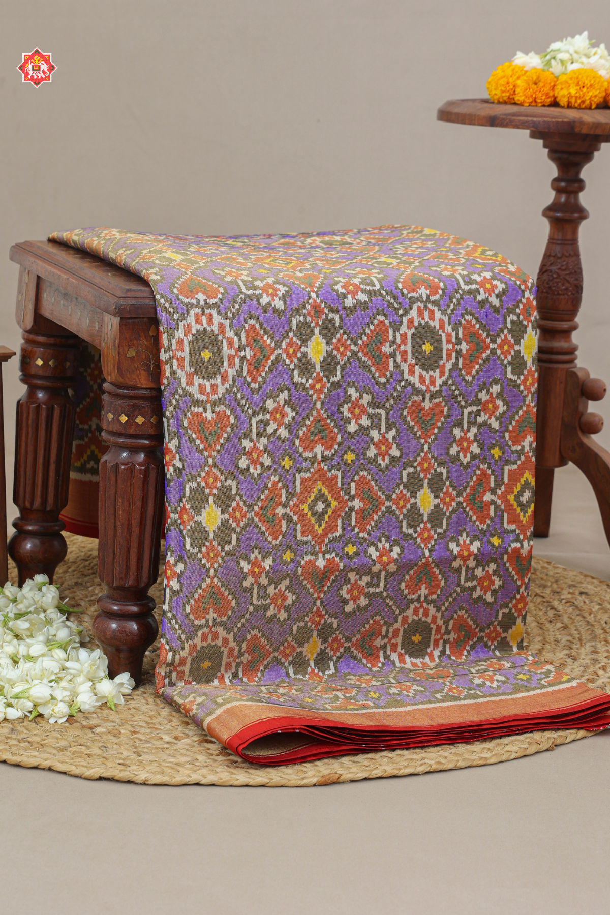 Manek chowk design small plain border tissue patola saree