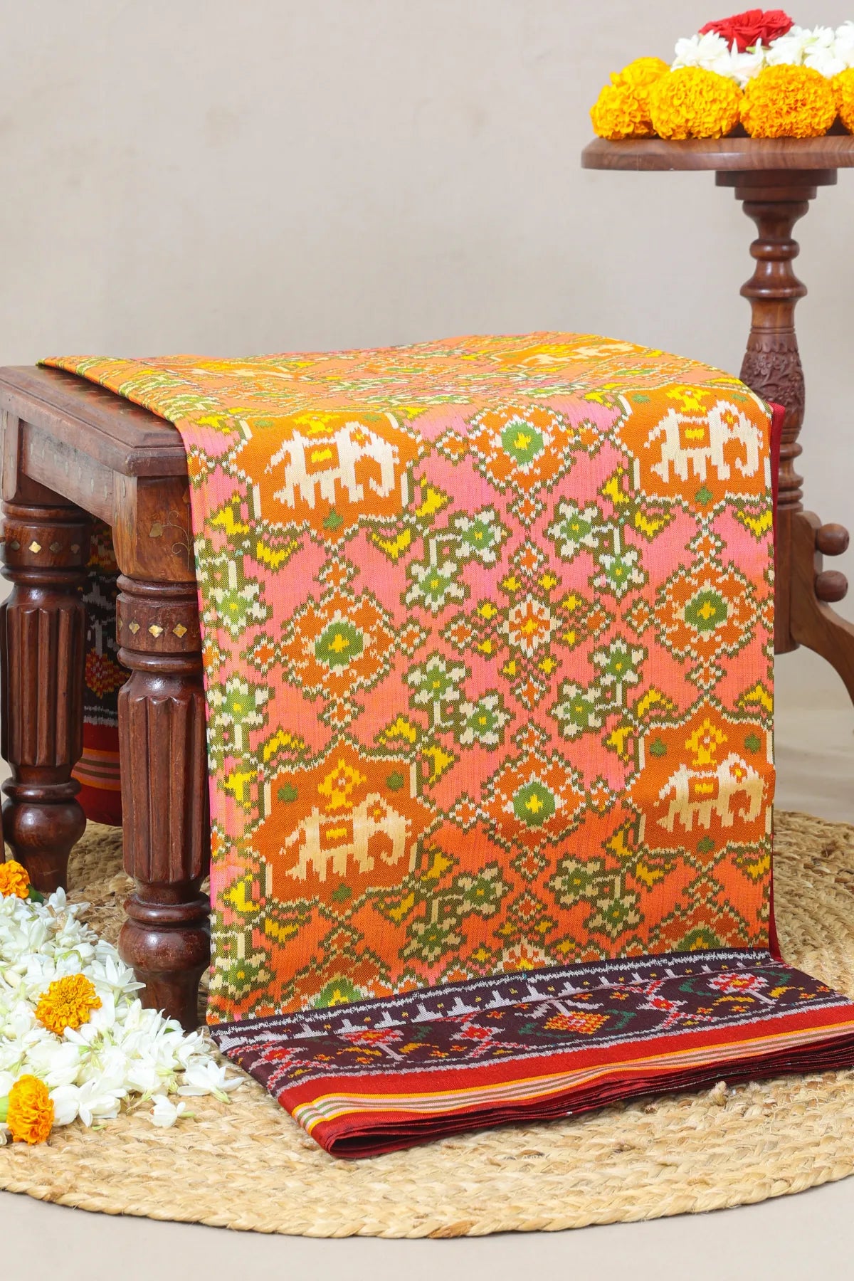 Traditional navratna design with elephant & border ghughroo design semi double ikat patola saree