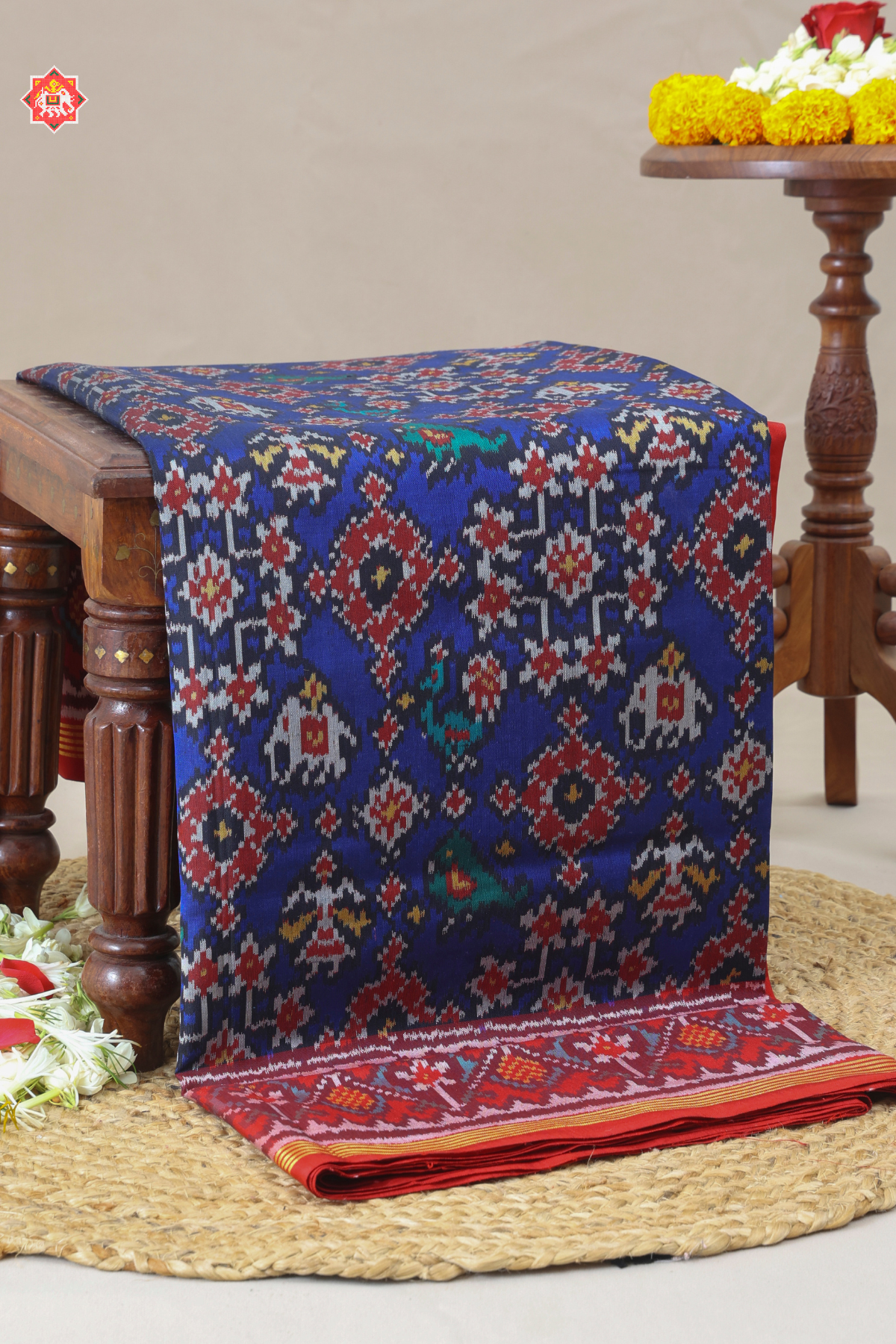 Traditional navratn design with small motif design semi double ikat patola saree