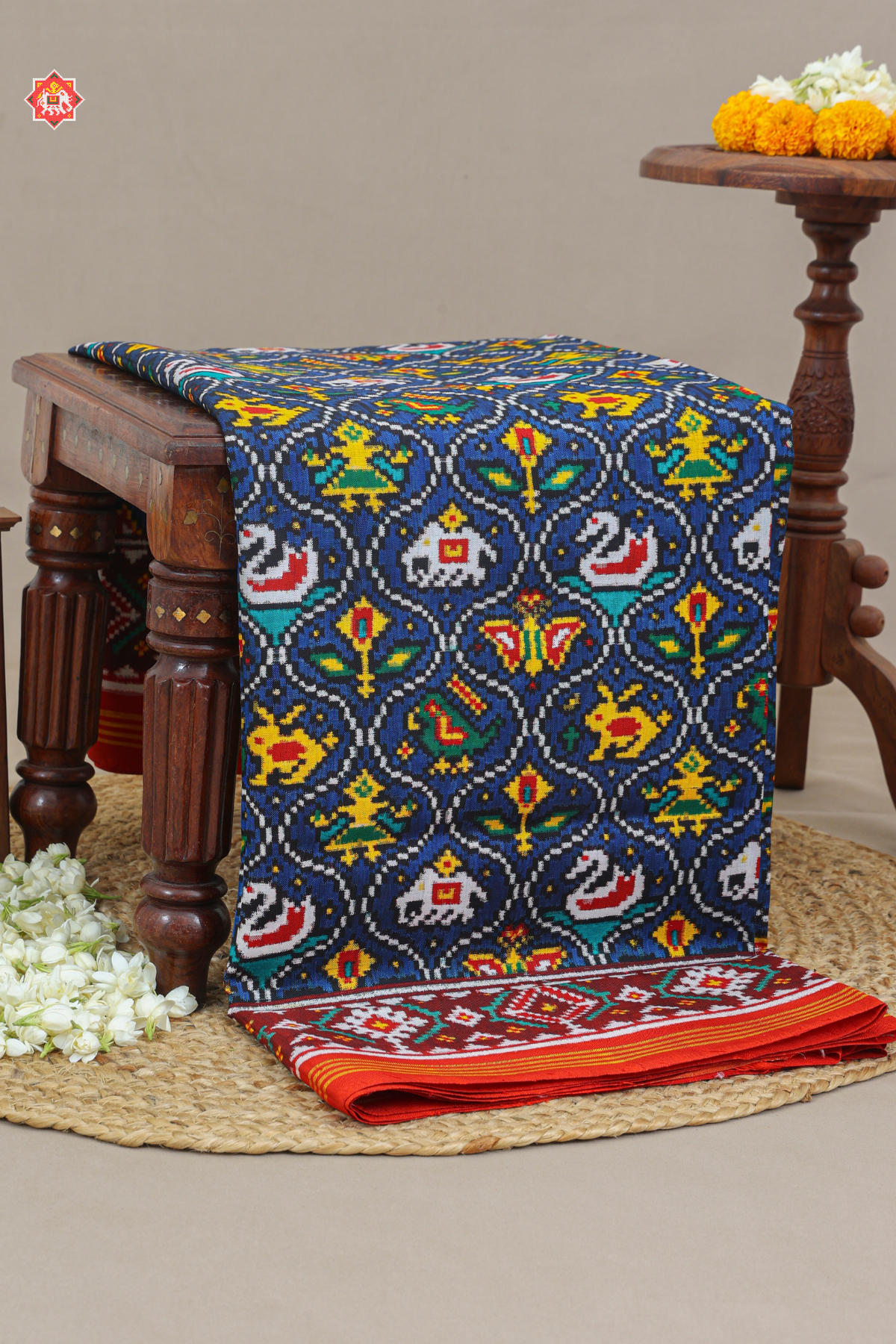 Small chabdi design with motif design pure double ikat patola saree