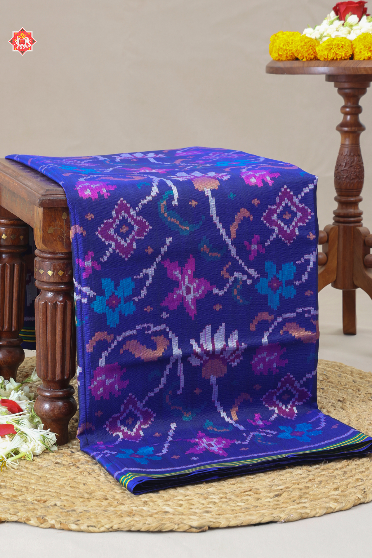 Master piece flowers with leaves design & small lines border semi double ikat patola saree