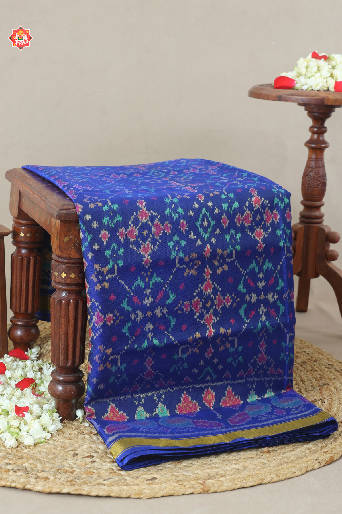 Navratna design with peacock small tissue border single ikat patola saree