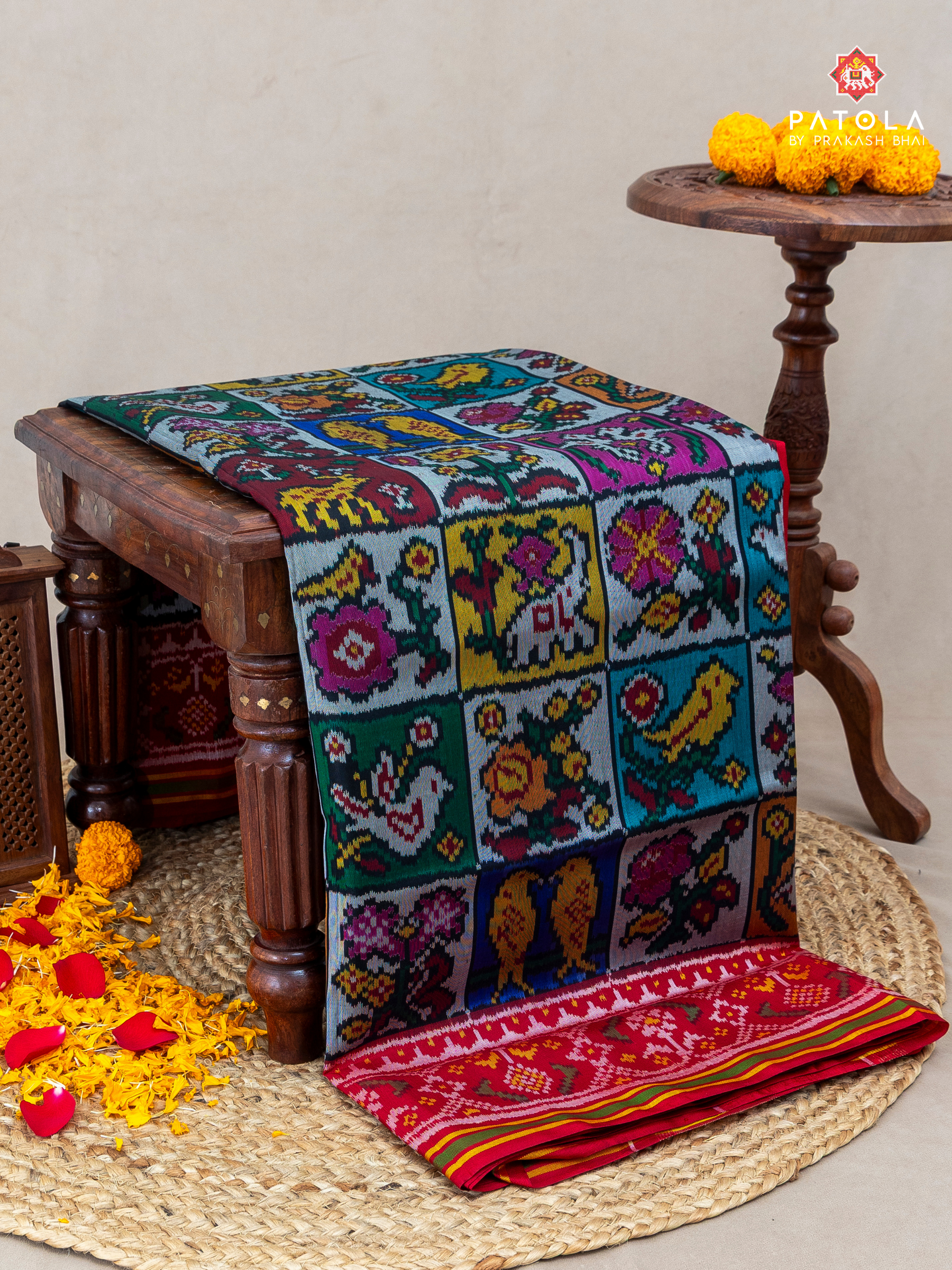 Masterpiece checks with 10 motrifs figure designer multicolours semi double ikat patola saree