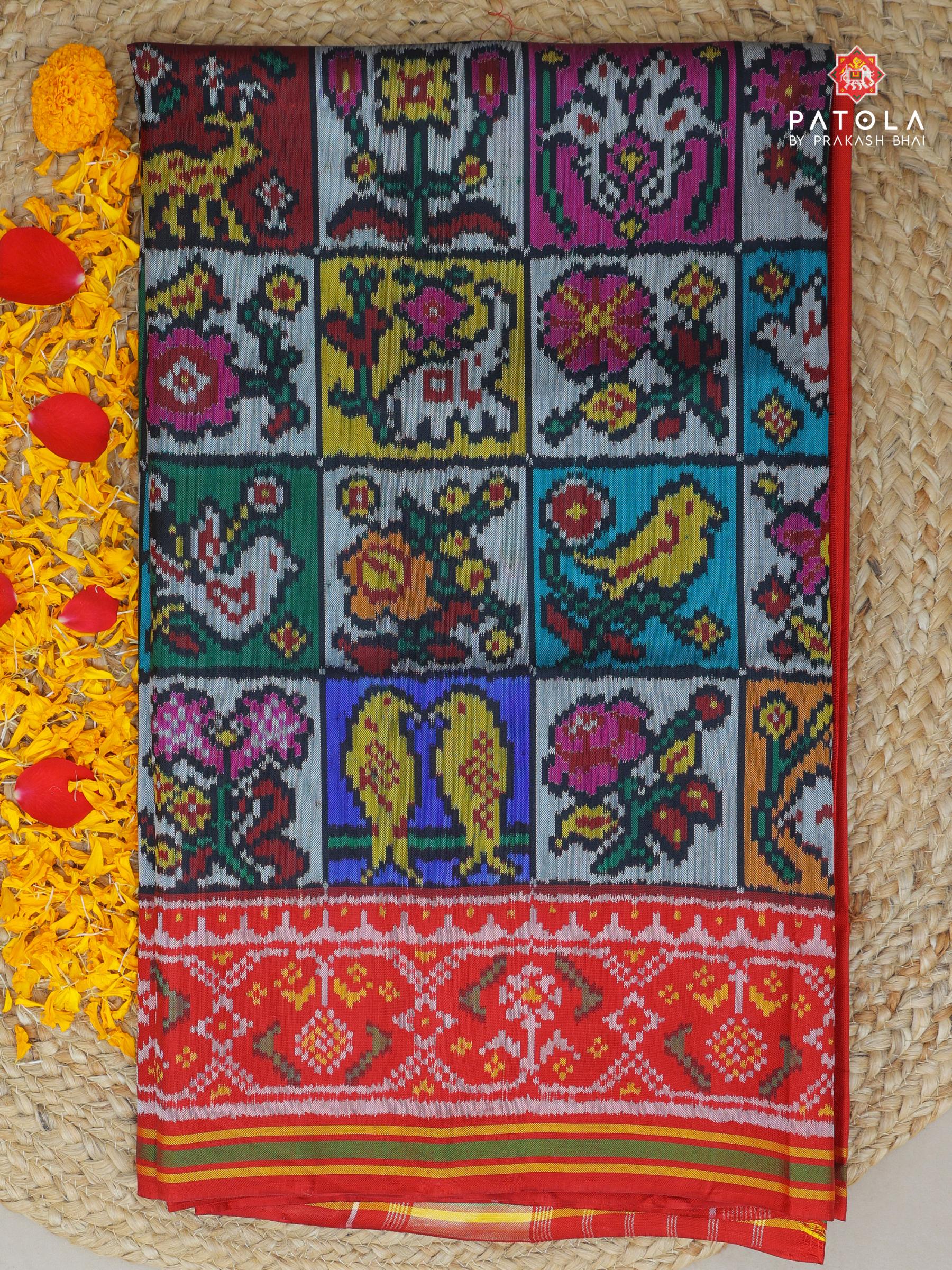 Masterpiece checks with 10 motrifs figure designer multicolours semi double ikat patola saree