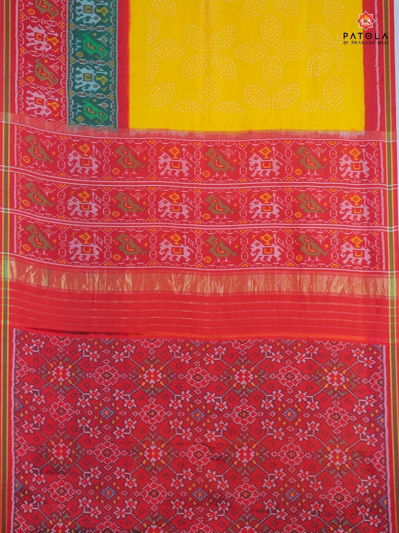 Two colors border with small bandhej patola saree Blouse design