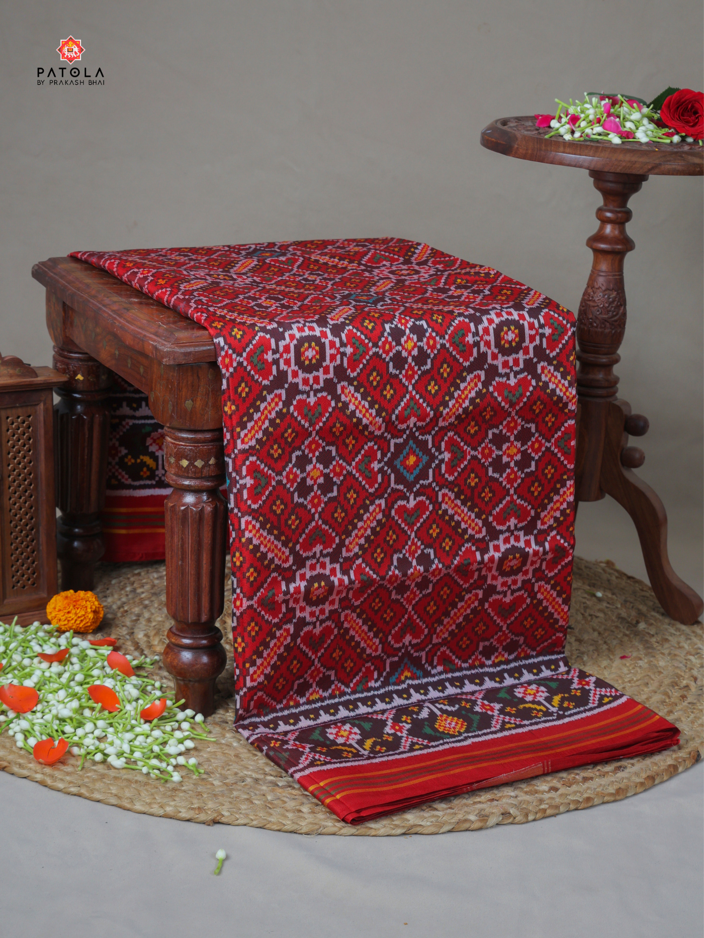 Manekchowk with border semi double ikat patola saree