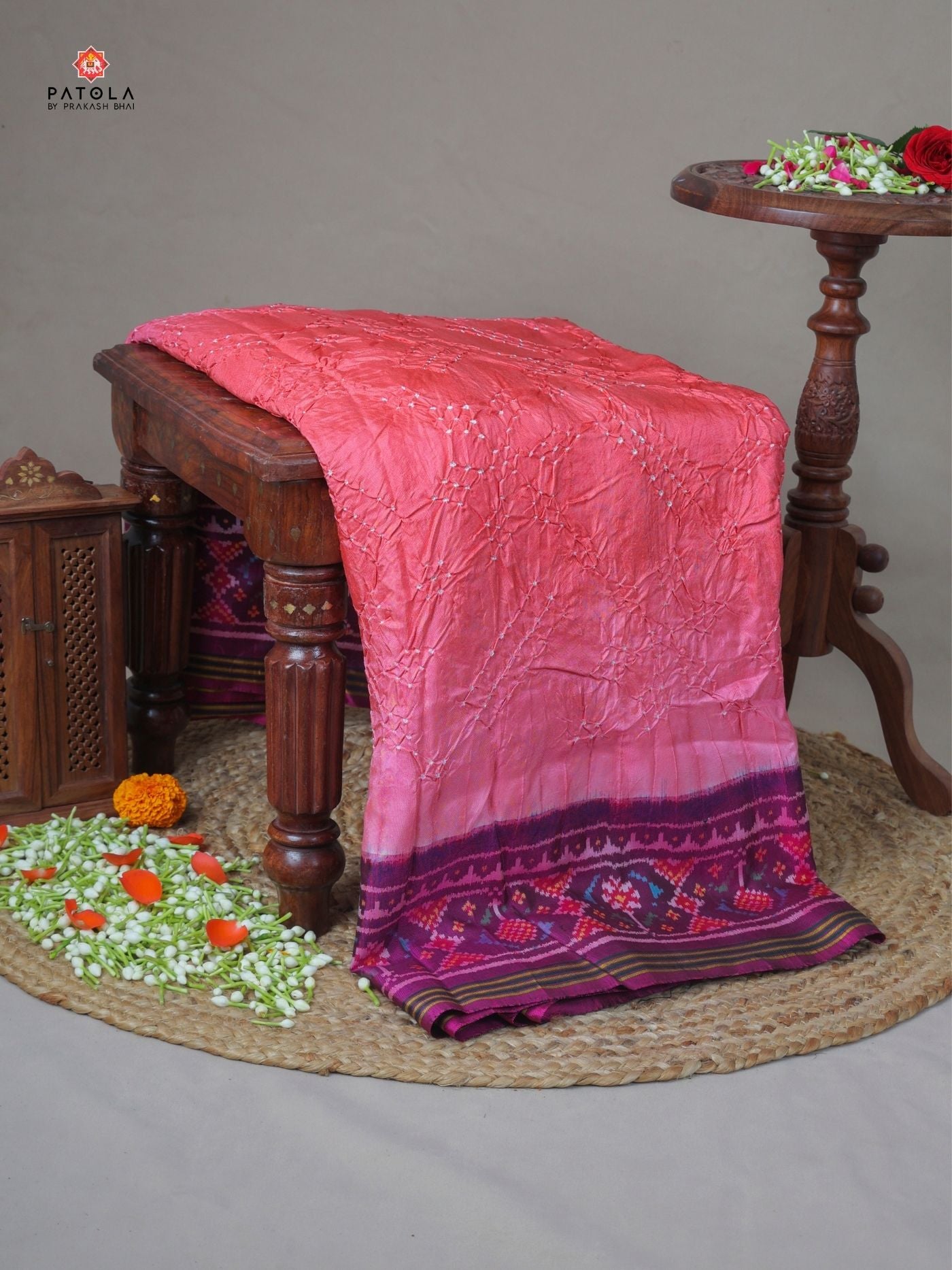 Master piece ghughroo border with small bandhej patola saree Blouse design