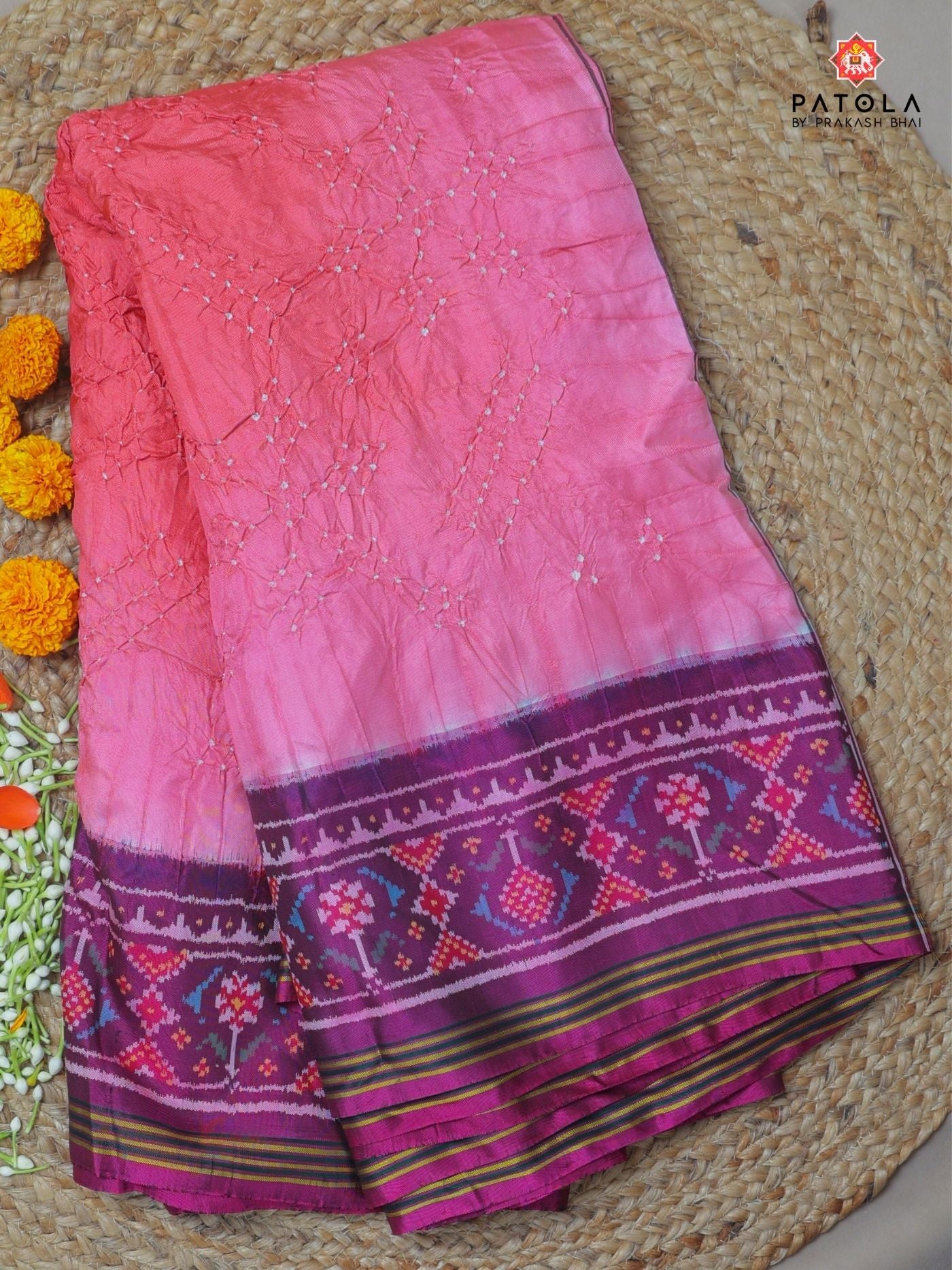 Master piece ghughroo border with small bandhej patola saree Blouse design