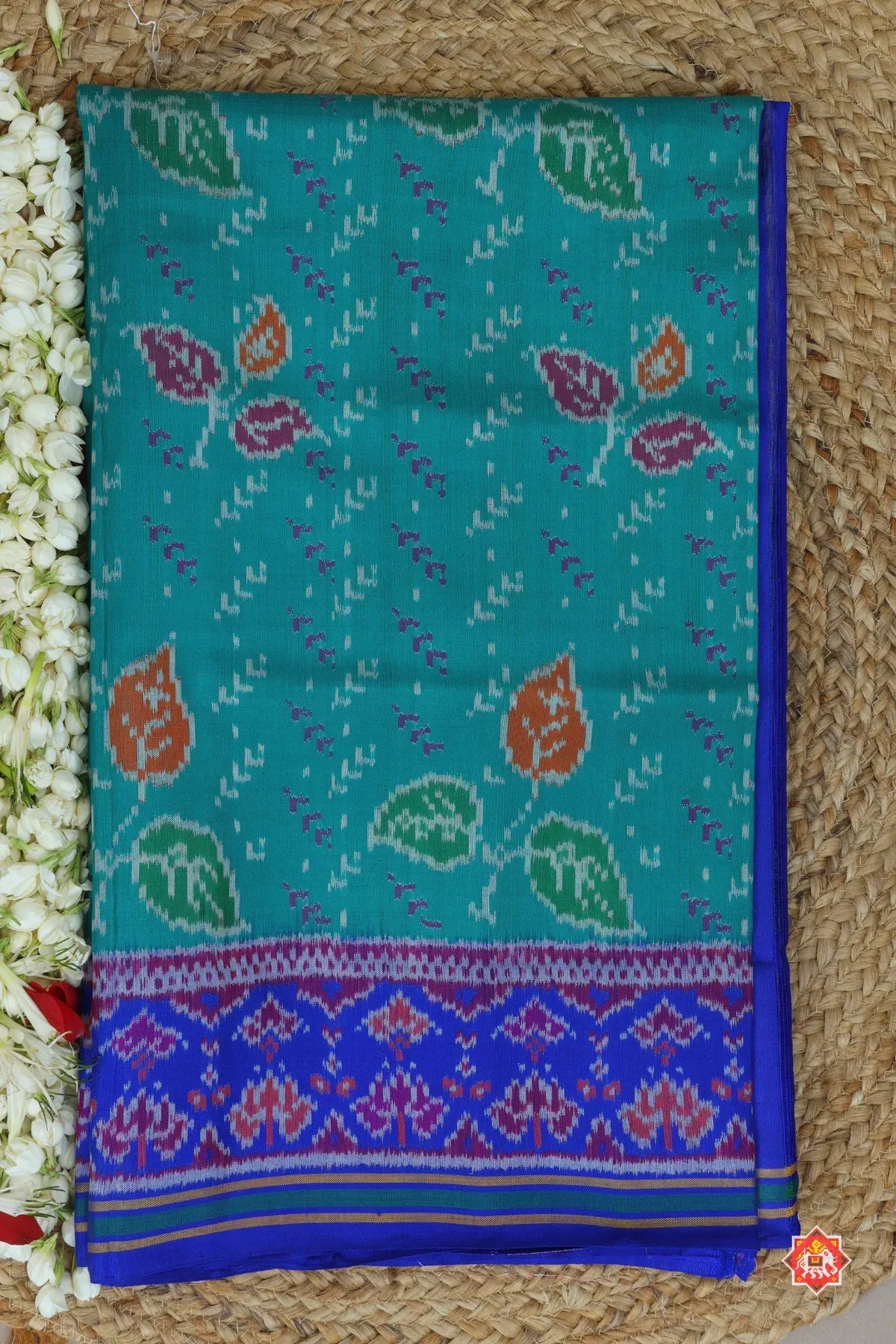 Masterpiece leaves design & pallu border flowers design semi double ikat patola saree