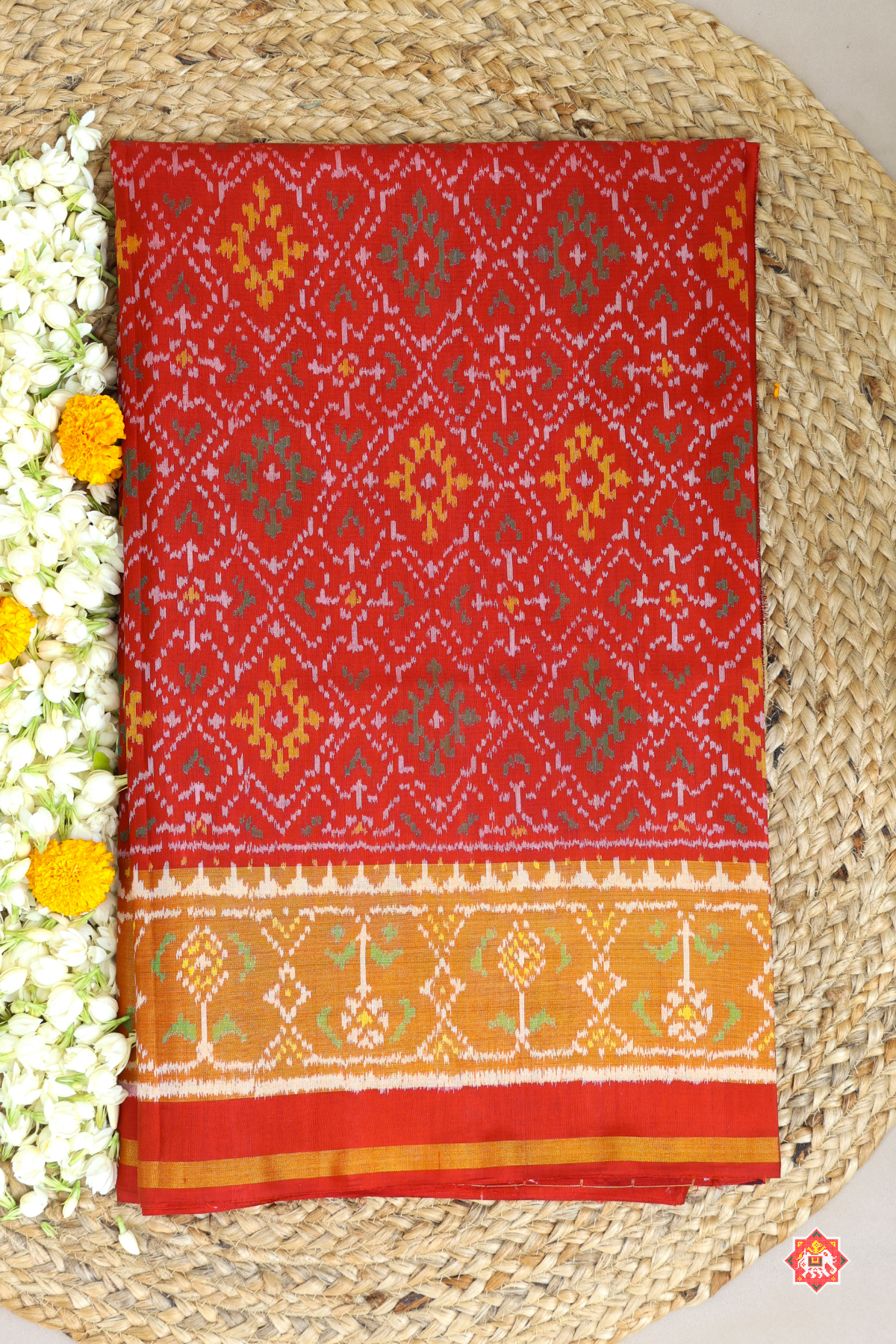 Paan chanda design with tissue border single ikat patola saree