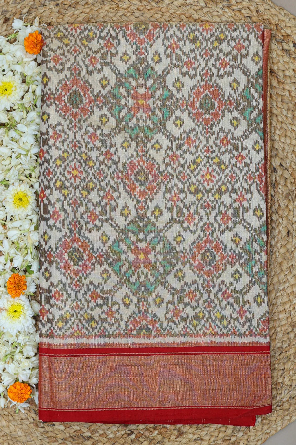 Navratna design with minakari work  tissue patola saree