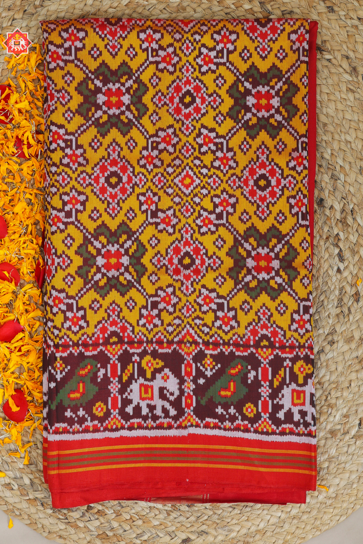 Navratna designer with pallu border motif design  Semi double ikat patola saree