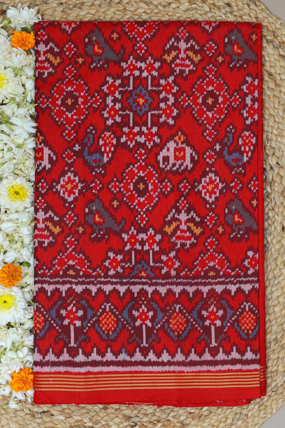Traditional navratna with motifs design palllu border flowers design semi double ikat patola saree