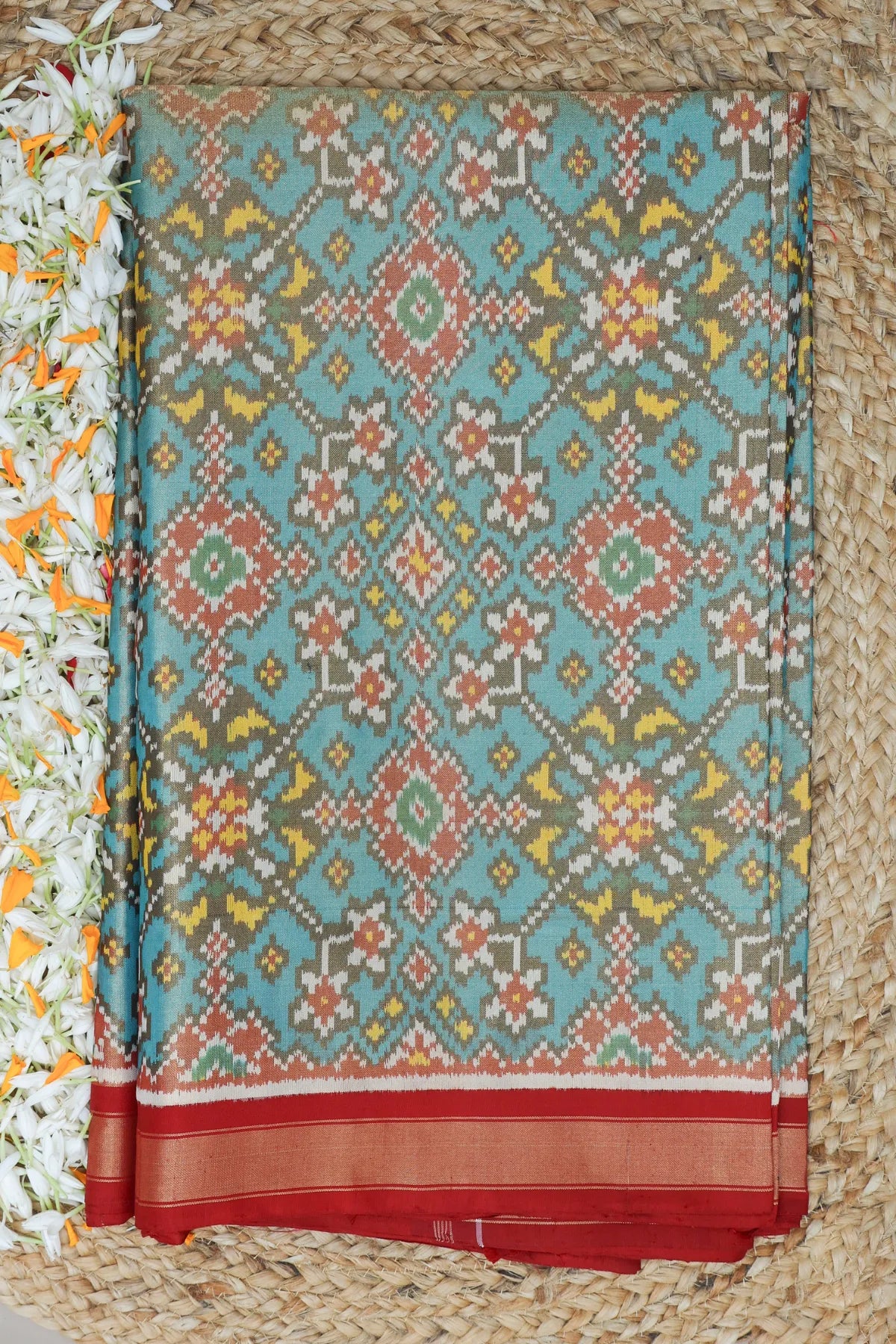 Navratna design with minakari work  tissue patola saree
