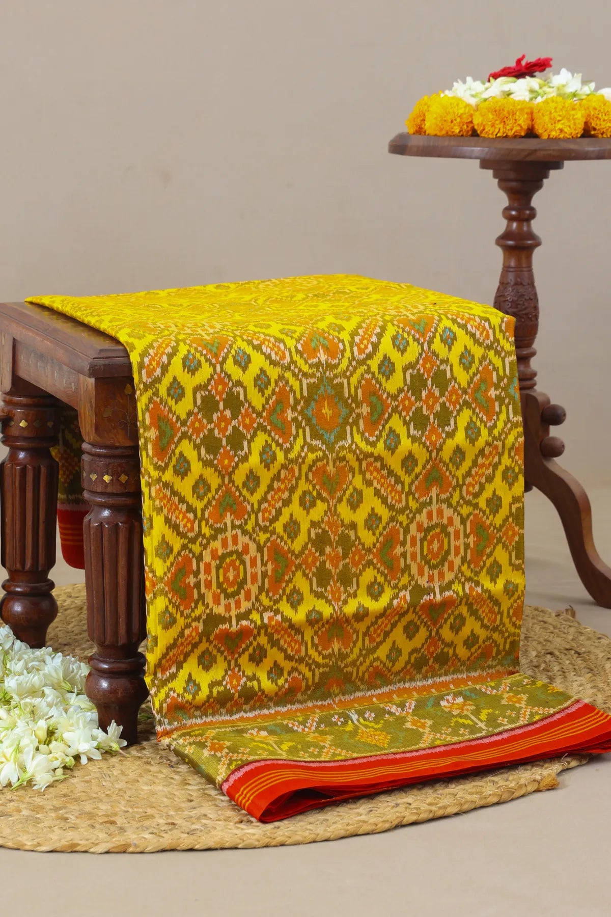 Minakari work & manek chowk design with ghughroo pallu border single ikat patola saree