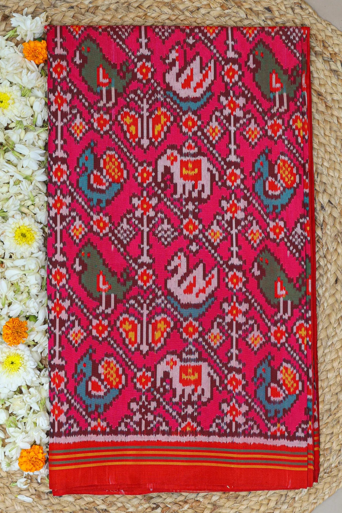 Cross laheriya with motifs design semi double ikat patola saree