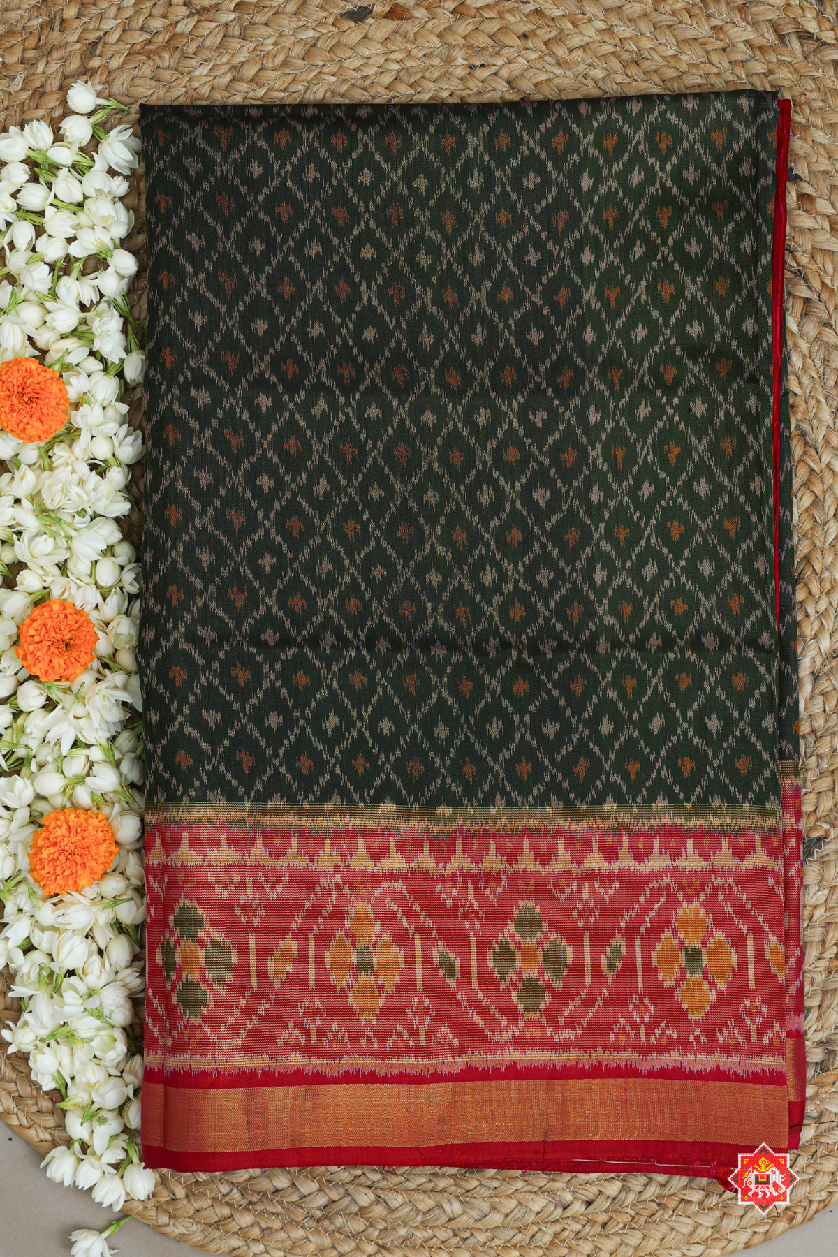 Small checks with dots pallu border contras single ikat patola saree