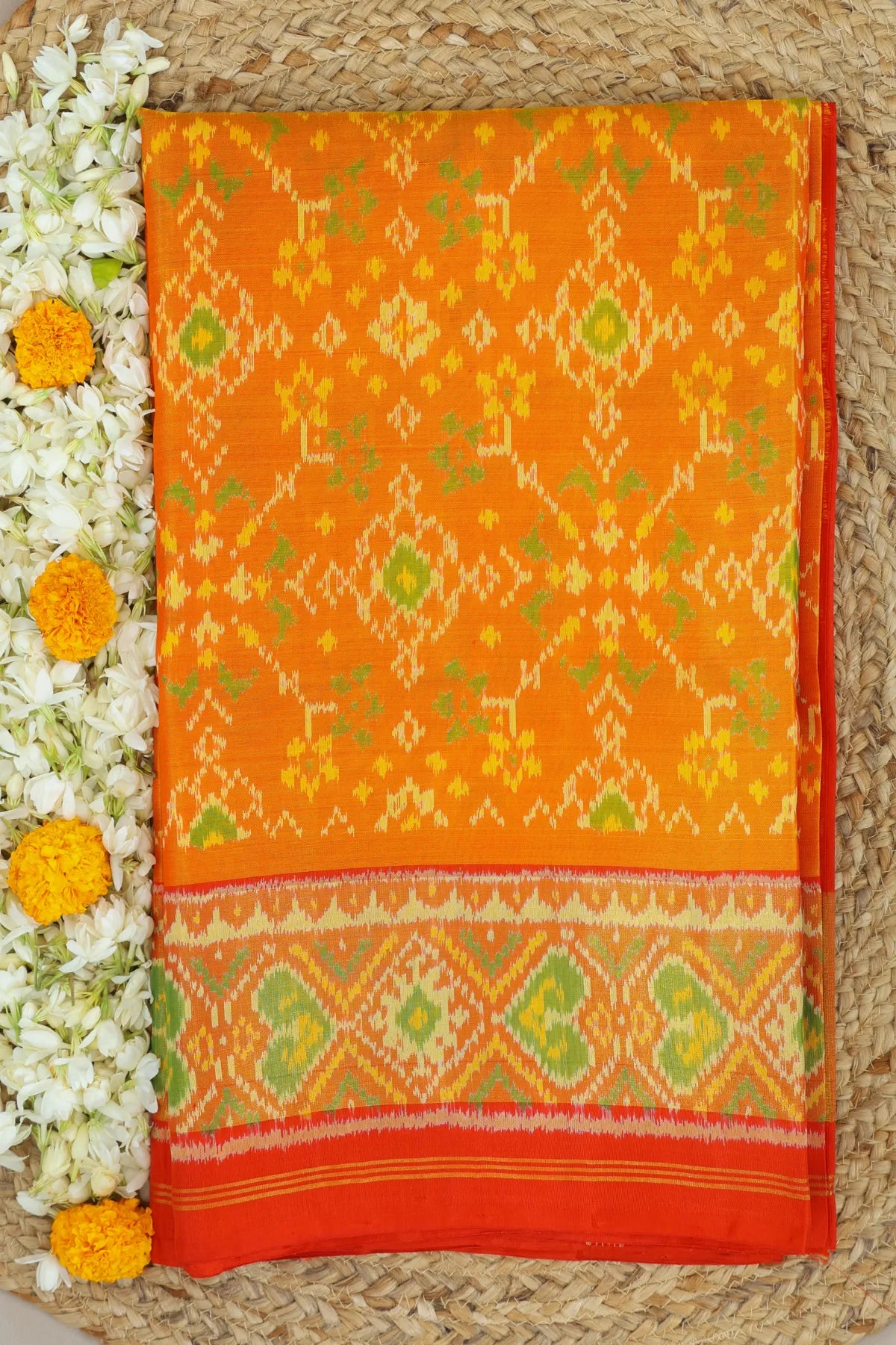 Navratna design with pallu border contras single ikat patola saree
