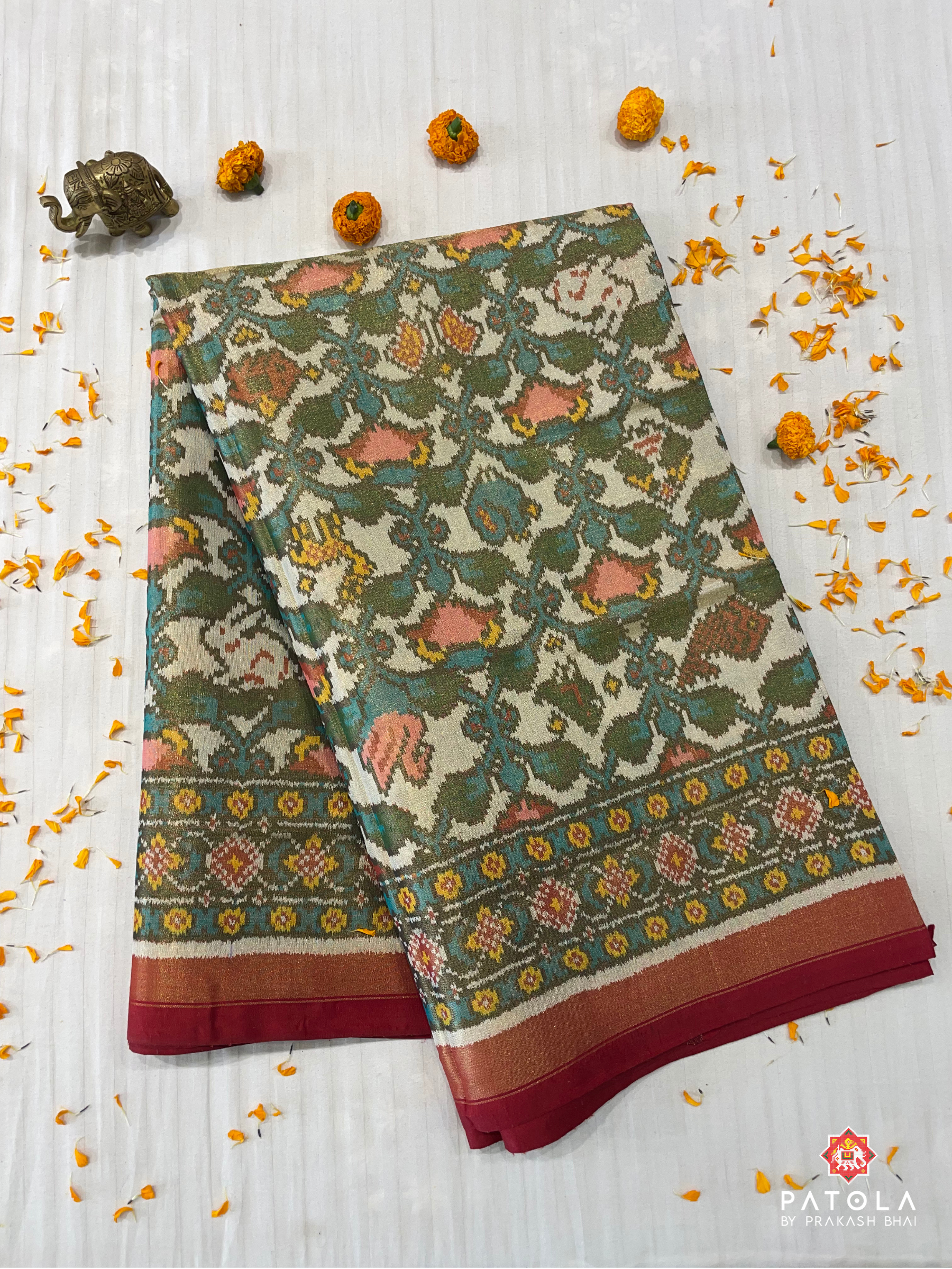 Small Figures With New Designer Tissue Patola Saree