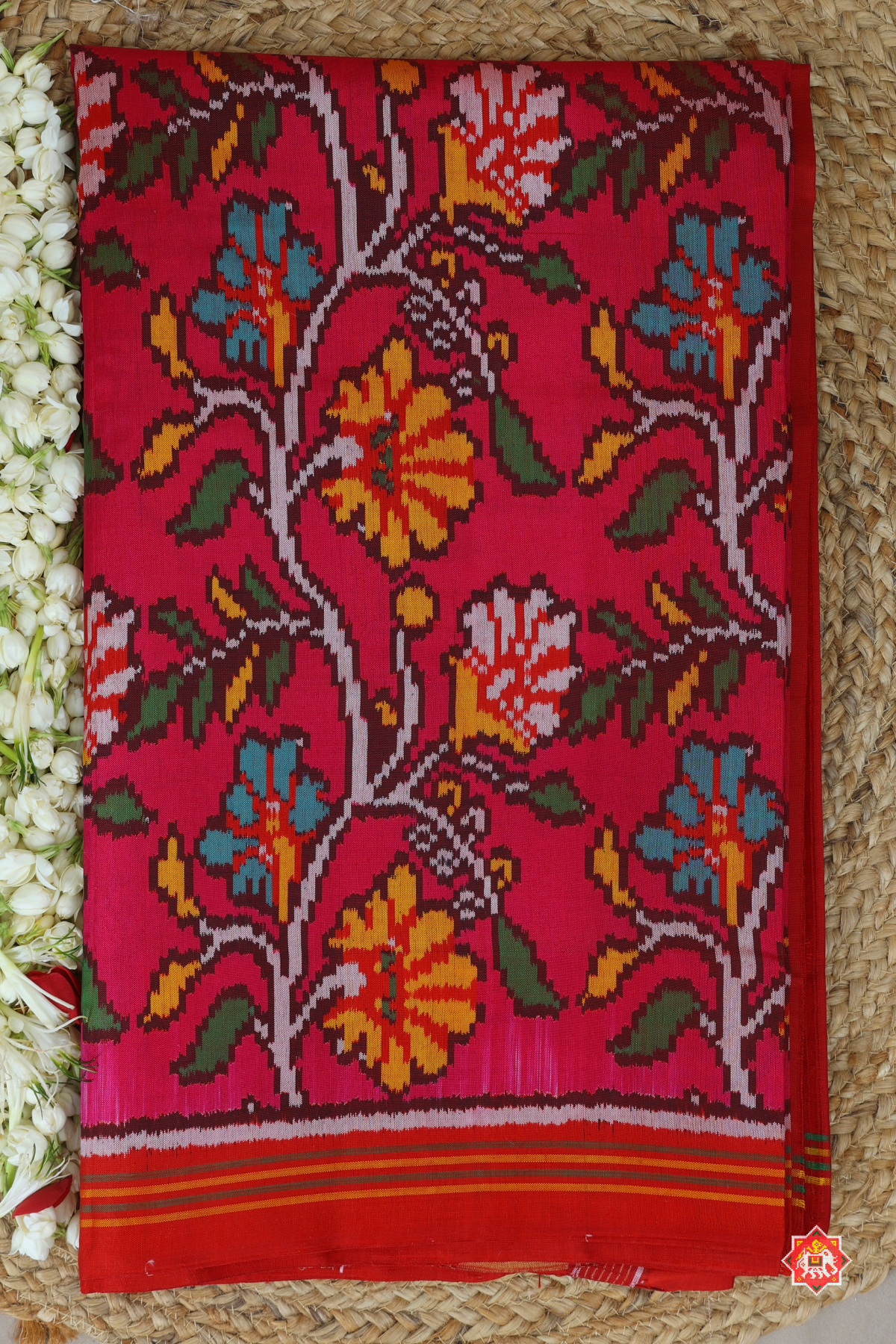 Master piece flowers with leaves design & small lines border semi double ikat patola saree