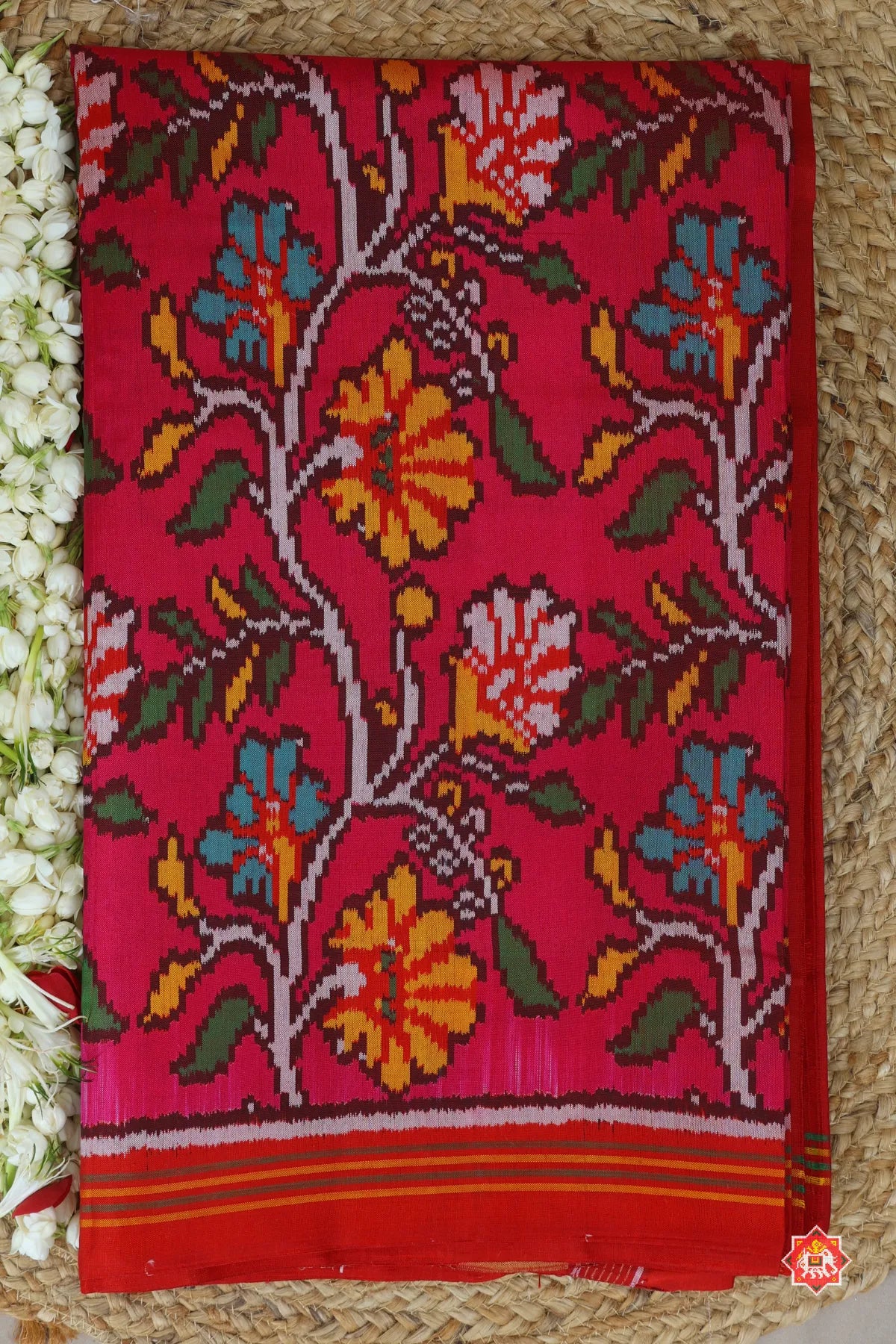 Master piece flowers with leaves design & small lines border semi double ikat patola saree