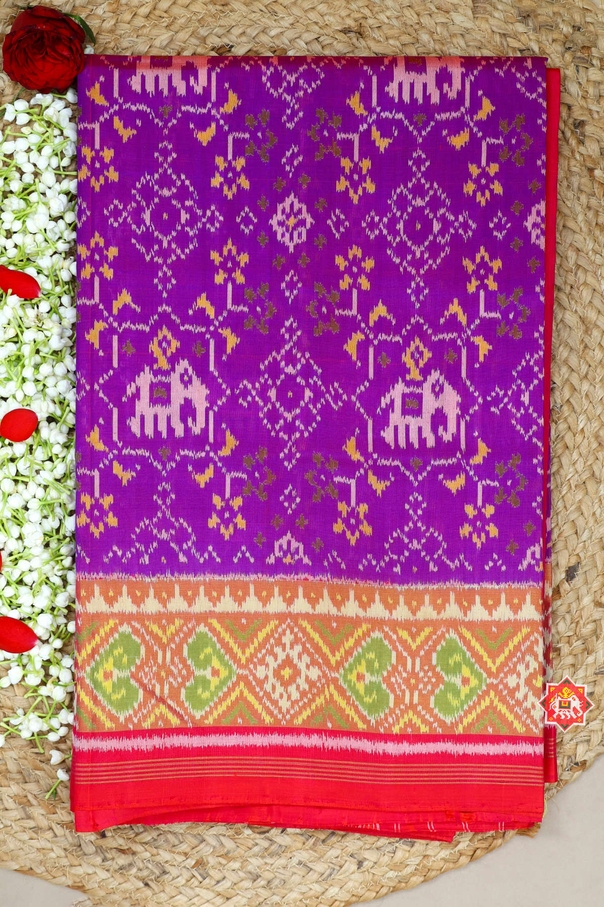 Navratna design with elephant tissue border single ikat patola saree