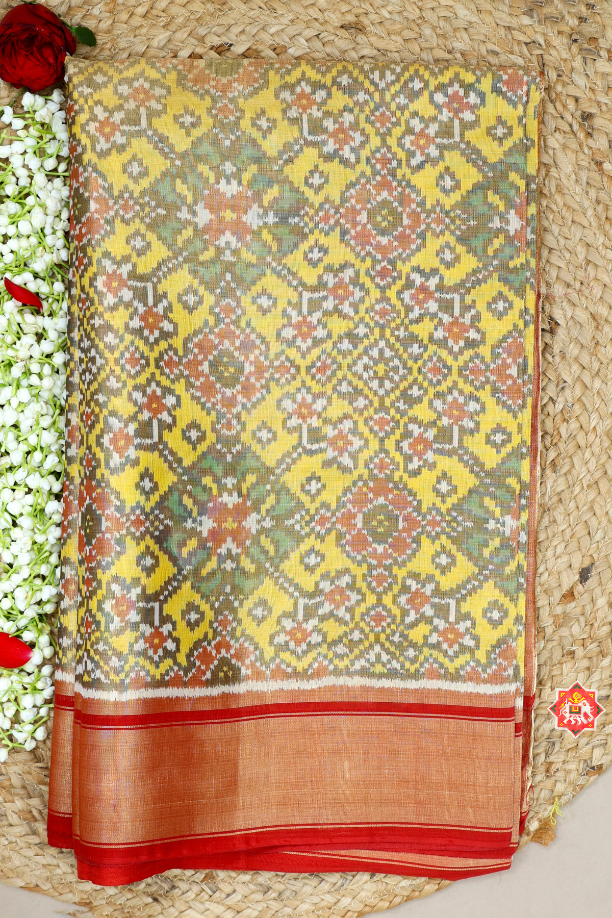 Navratna design with plain border tissue patola saree