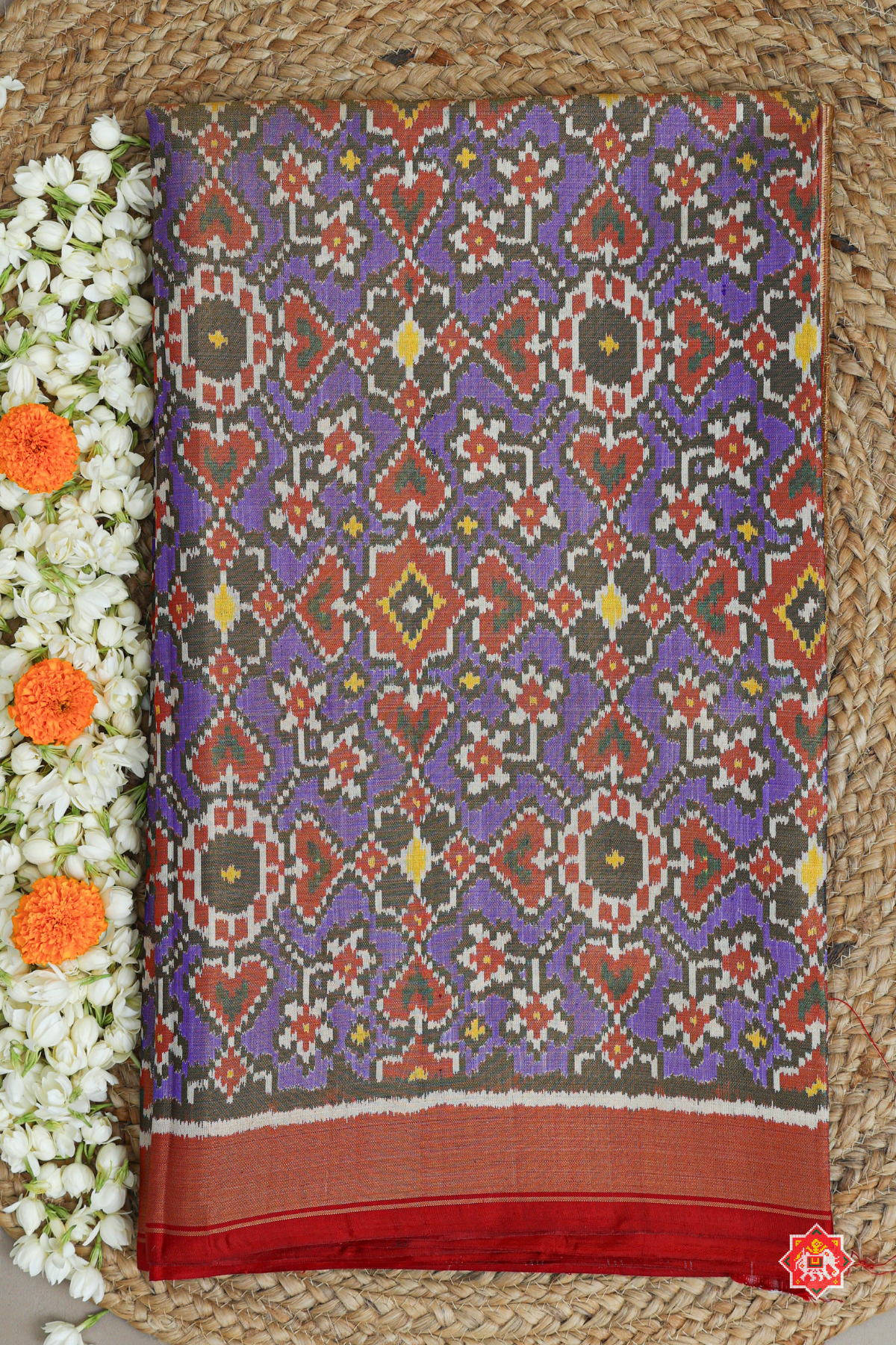 Manek chowk design small plain border tissue patola saree