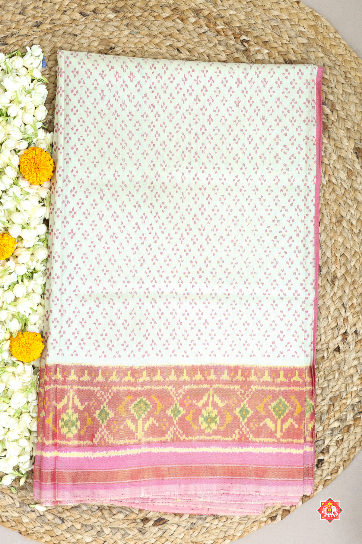 Small dots with tissue border single ikat patola saree