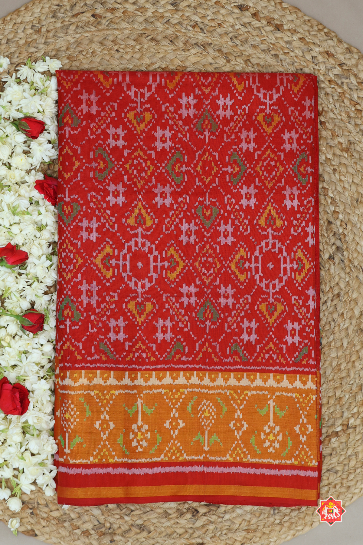 Paan chanda design with ghugroo tissue border single ikat patola saree