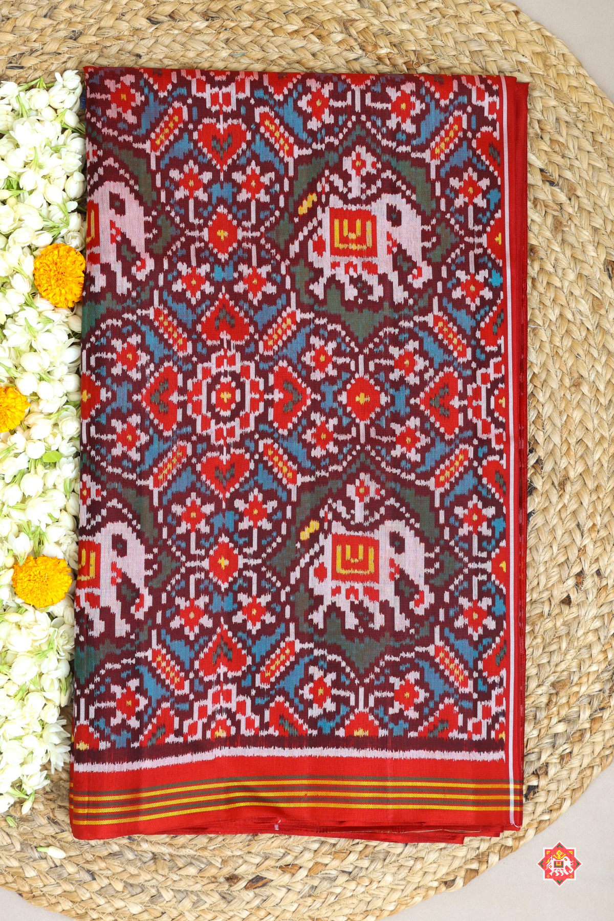 Maneck chowk design with elephant small lines border semi double ikat patola saree