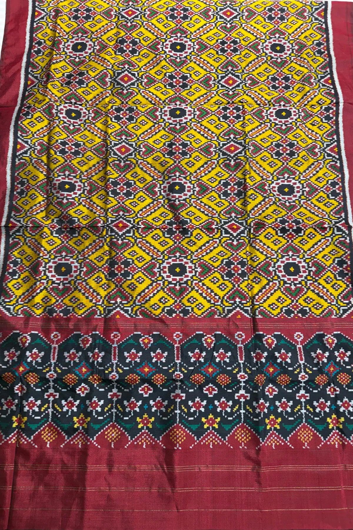 Manek chowk design with minakari work semi double ikat patola dupatta