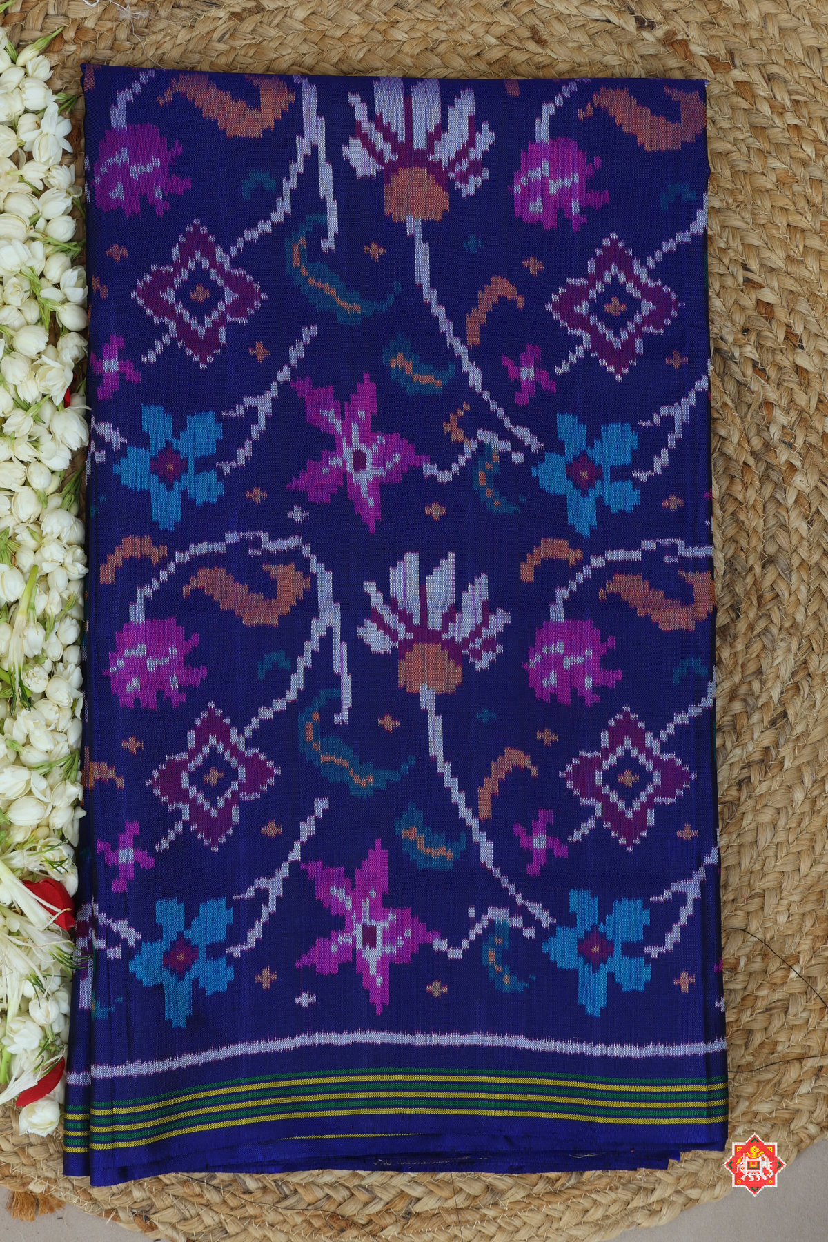 Master piece flowers with leaves design & small lines border semi double ikat patola saree