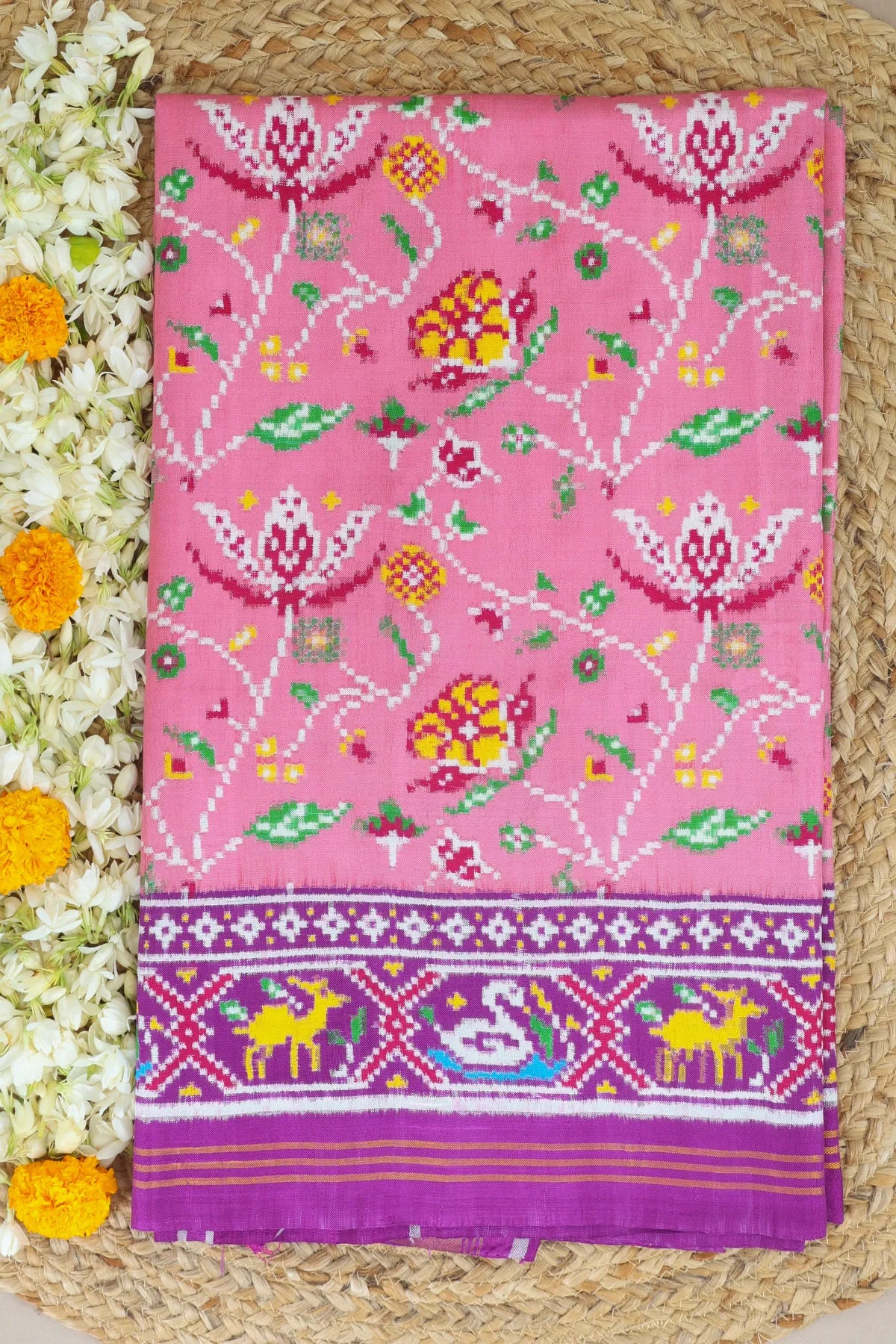 Patan patola traditional master piece rangoli design with border pallu motif design double ikat saree