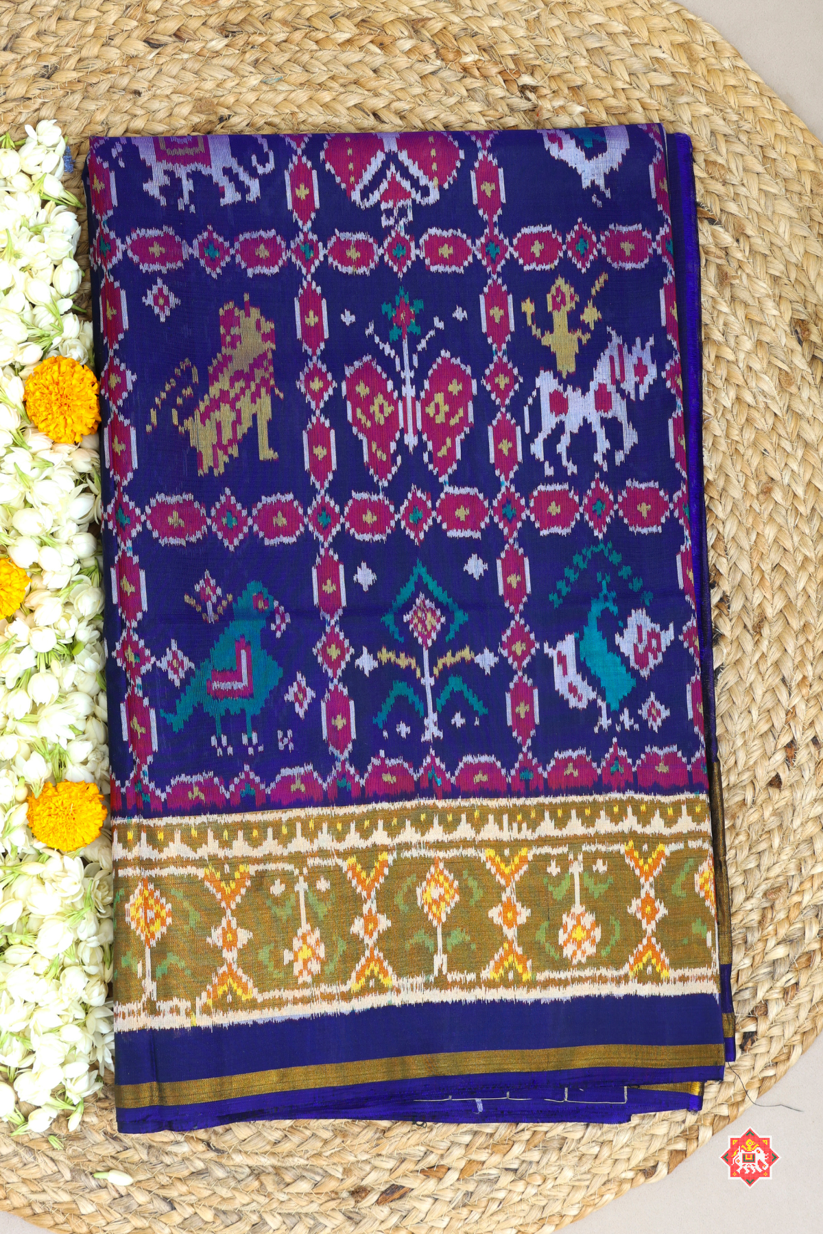Maserpiece 9 motif design with tissue border single ikat patola saree