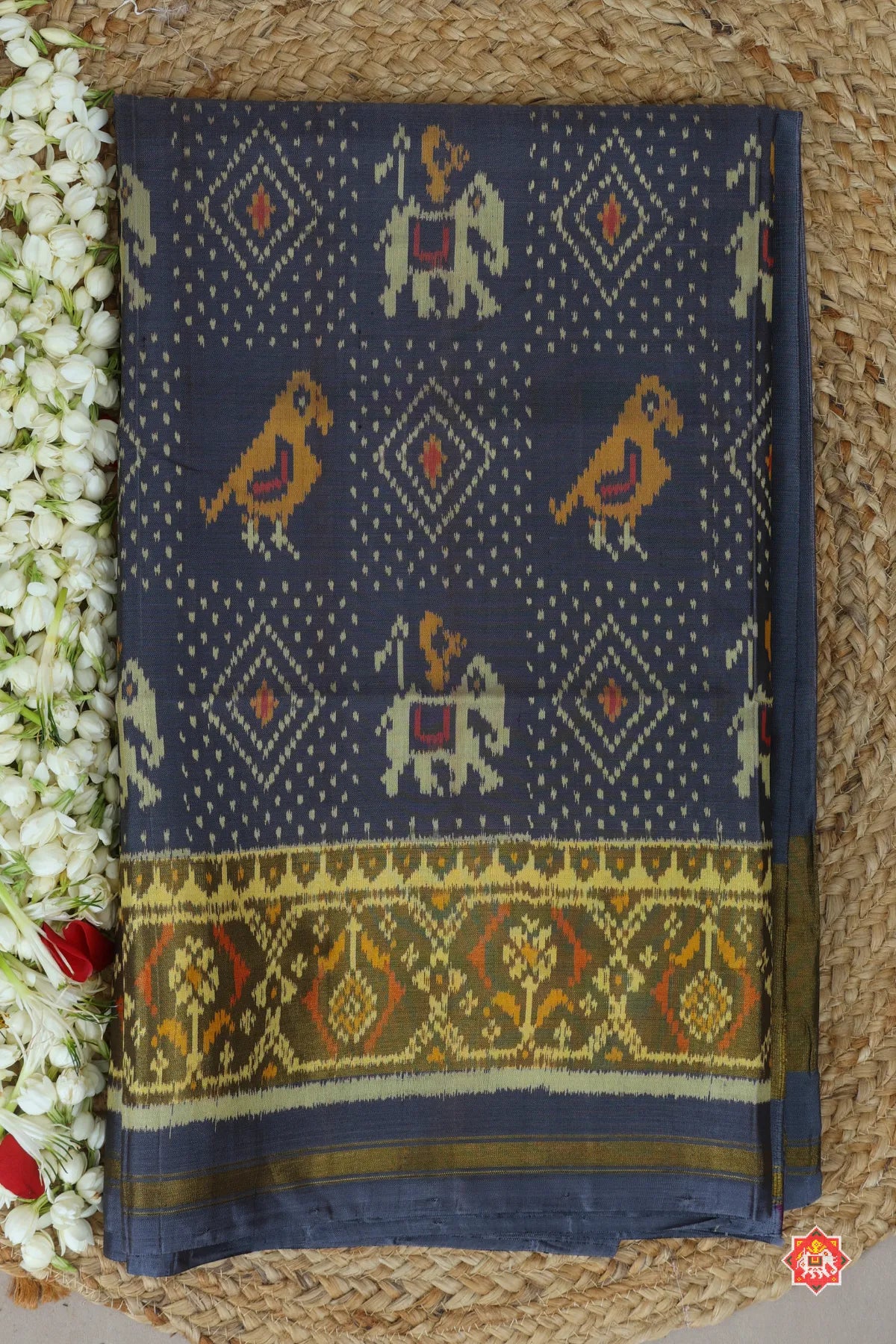 Motif design with tissue ghughroo border single ikat patola saree