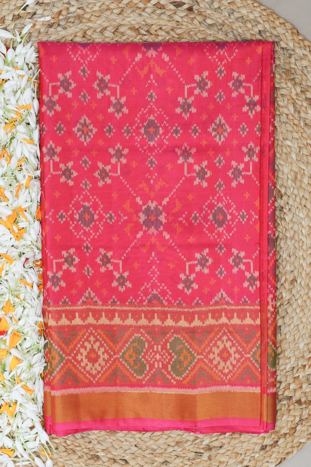 Navrtana design with tissue border single ikat patola saree