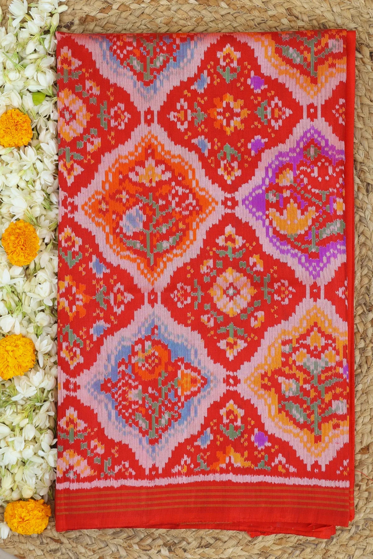 Stylis floral design with small border semi double ikat patola saree