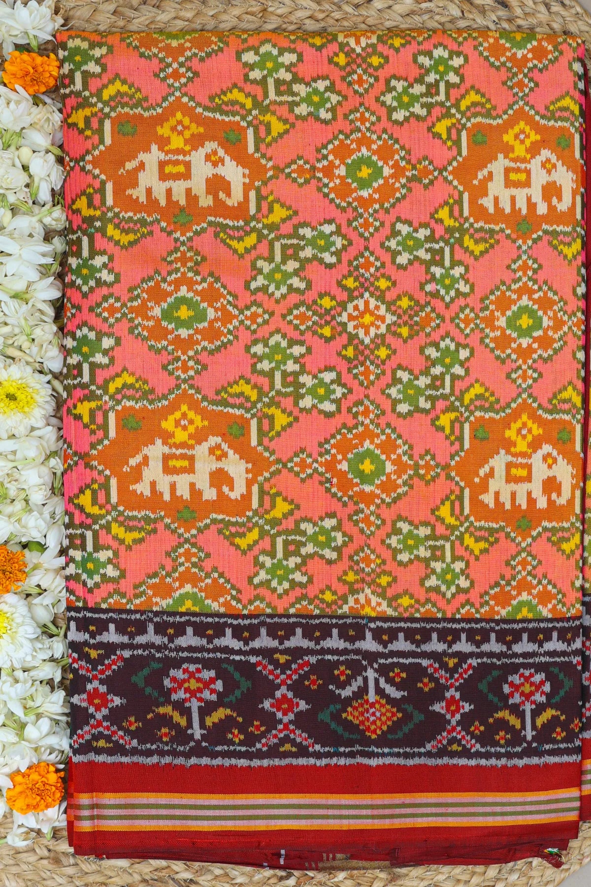 Traditional navratna design with elephant & border ghughroo design semi double ikat patola saree